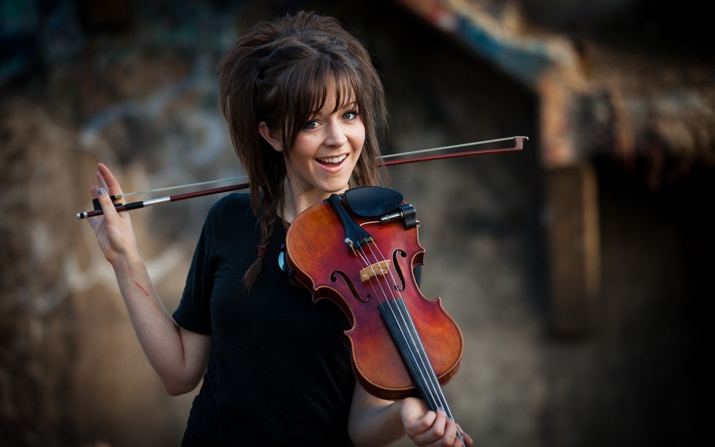 People 1440x900 Lindsey Stirling women musician black dress violin smiling women outdoors brunette long hair looking at viewer musical instrument