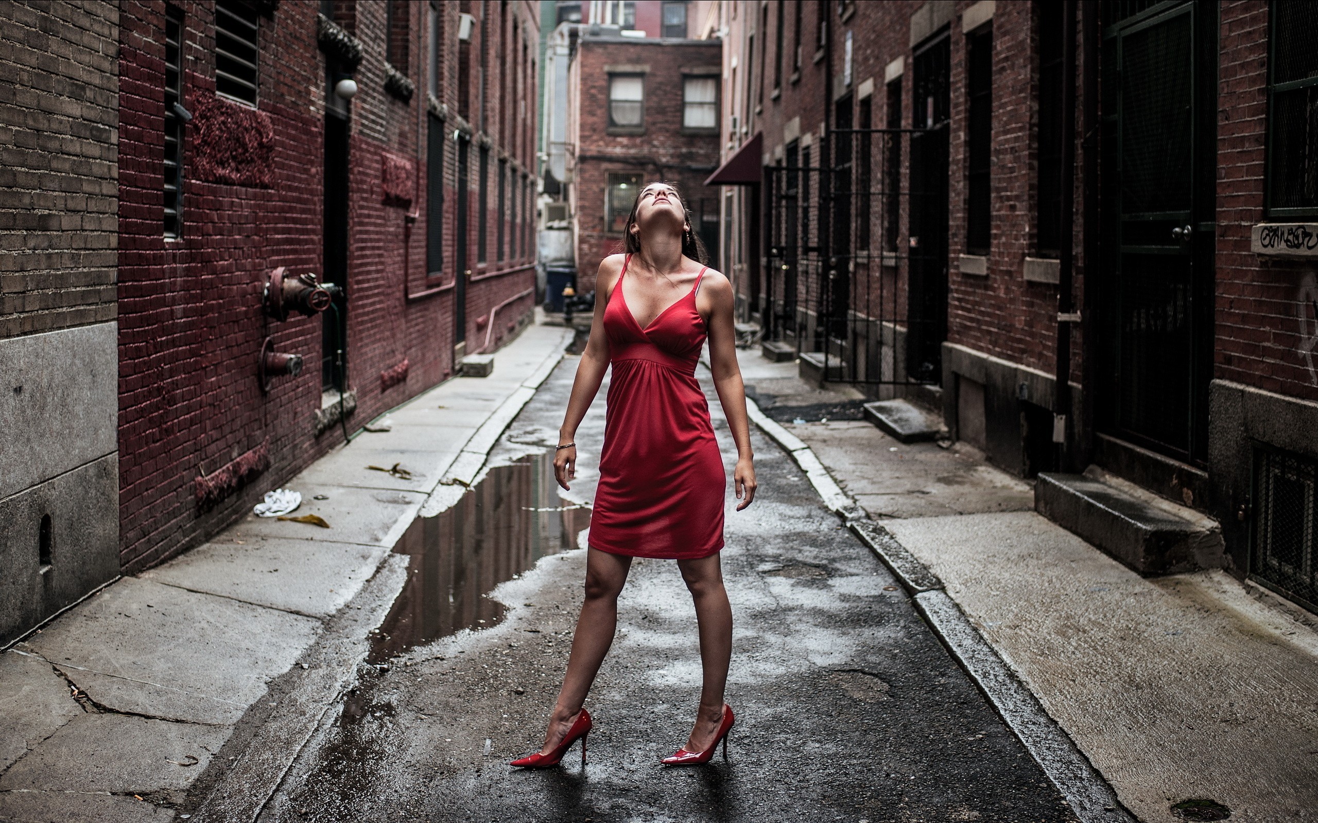 People 2560x1600 women brunette women outdoors red dress standing heels red heels urban outdoors legs looking up model