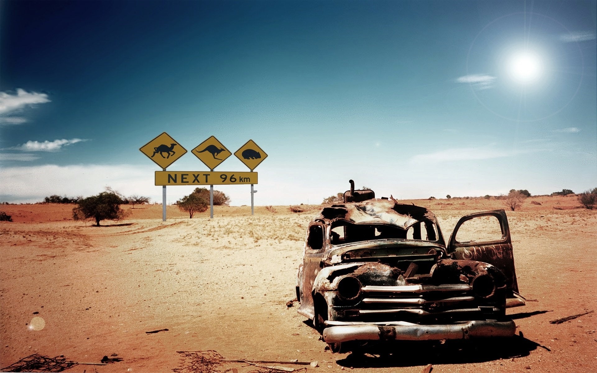 General 1920x1200 car desert sand rust sunlight sign wreck vehicle numbers sky