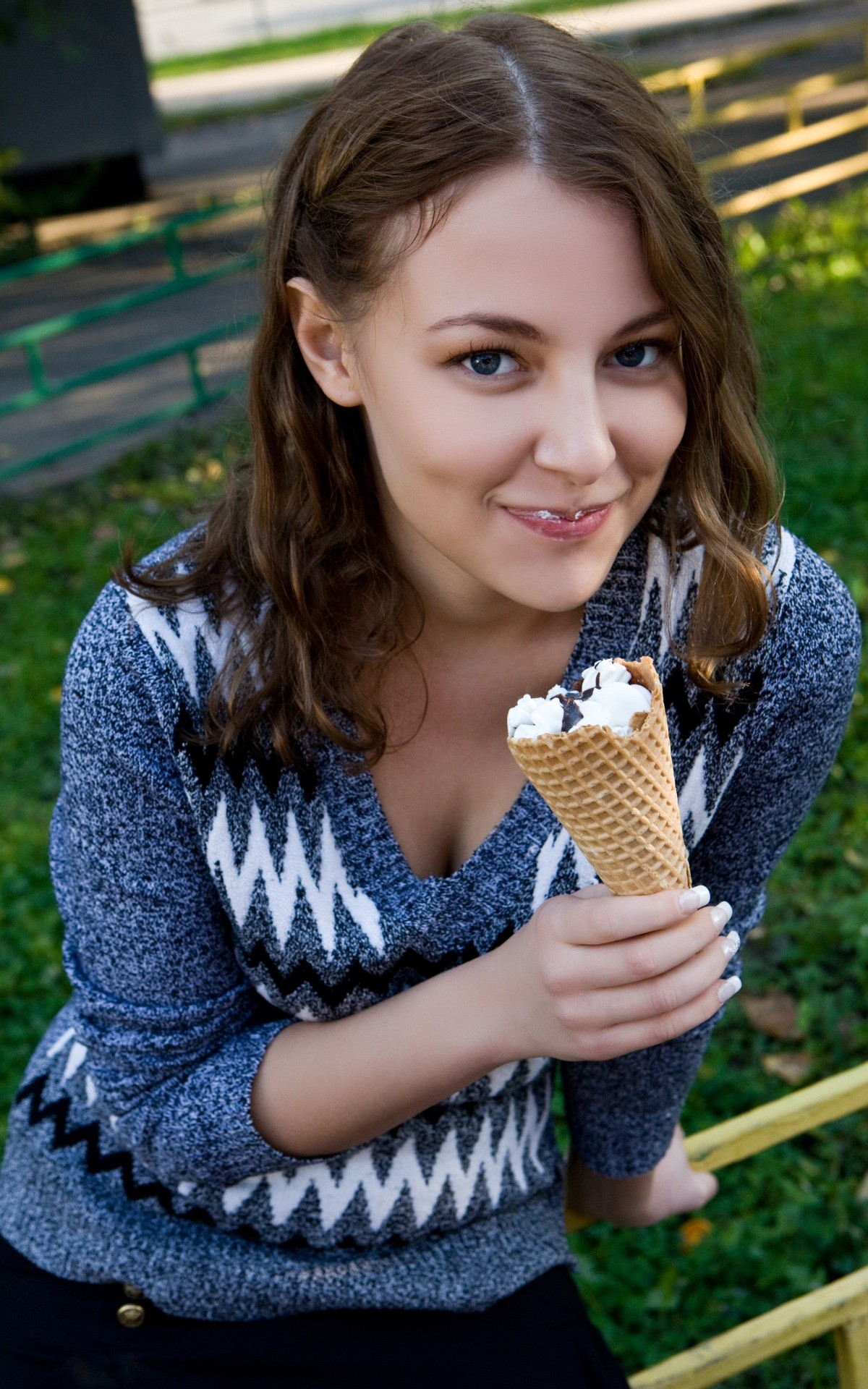 People 1200x1920 Nikia A cleavage women ice cream smiling MetArt eating women outdoors closeup portrait sweater blue sweater food sweets looking at viewer grass portrait display