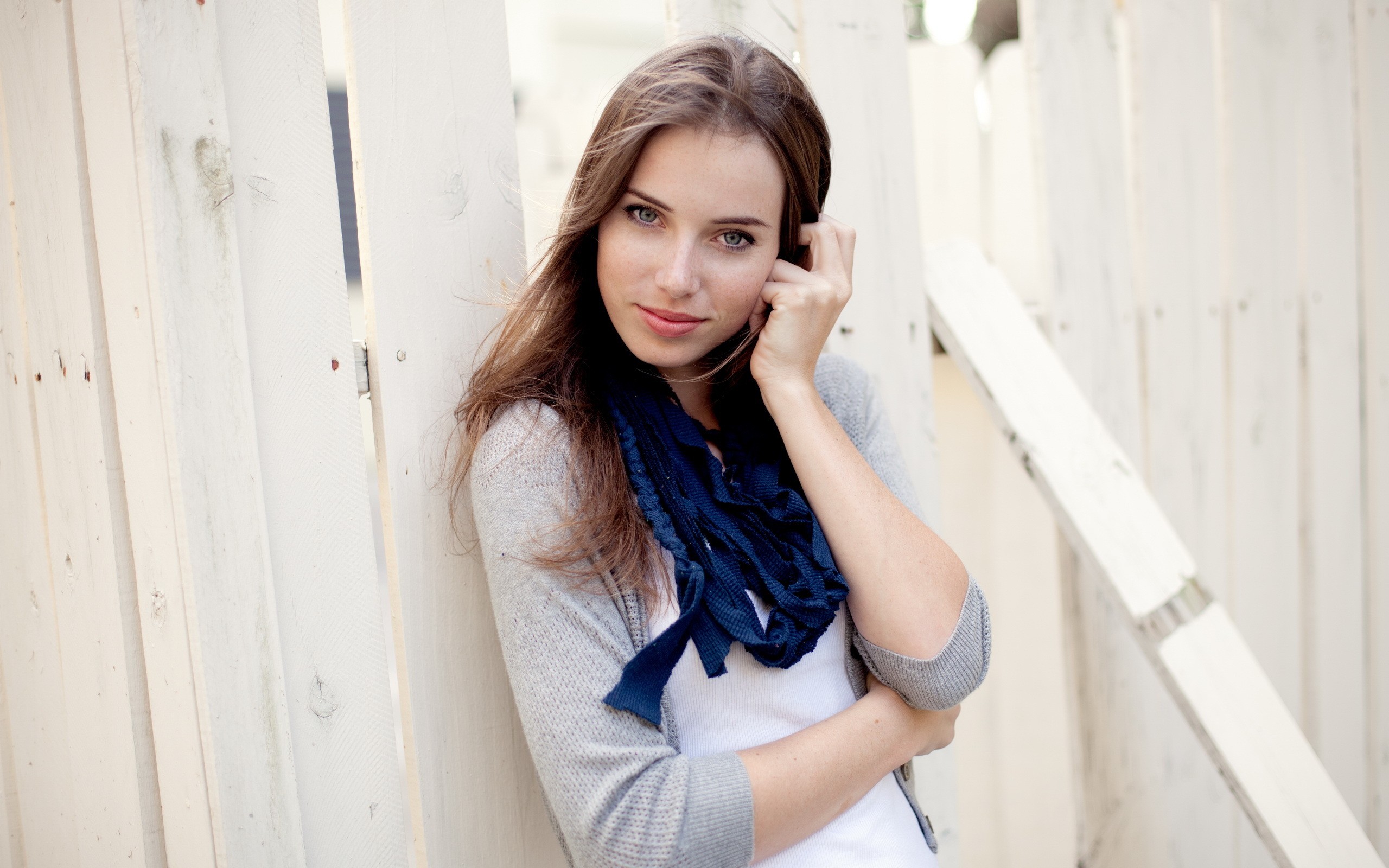People 2560x1600 brunette smiling scarf Megan Coffey women outdoors white clothing looking at viewer fence grey sweater open sweater women model gray eyes young women