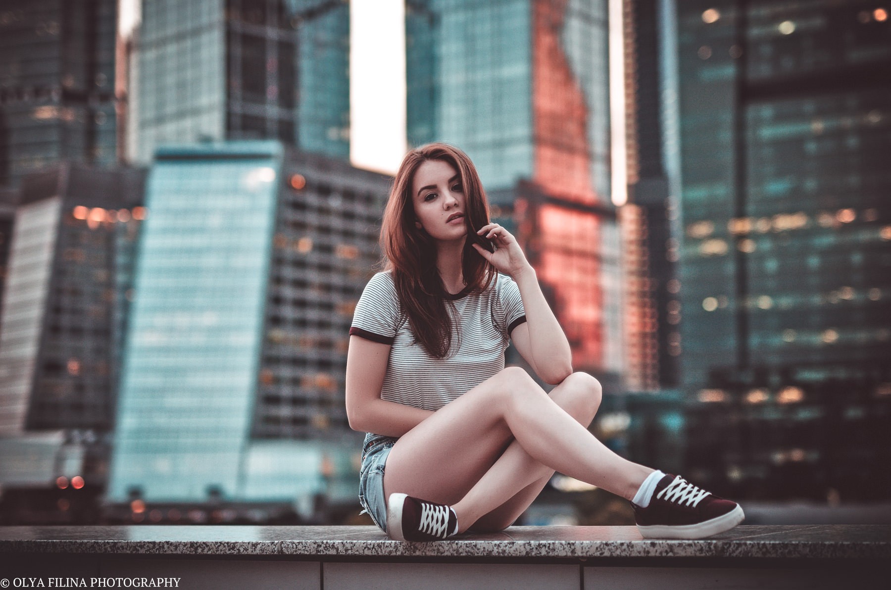 People 1800x1192 women sitting city portrait T-shirt striped tops Olya Filina women outdoors legs crossed looking at viewer long hair brunette model Russia Moscow outdoors watermarked