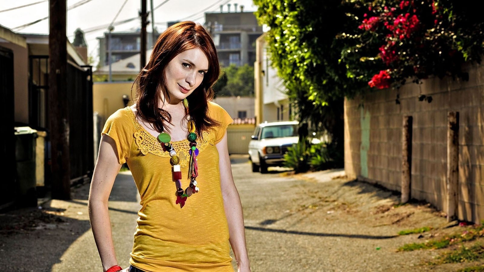 People 1600x900 Felicia Day actress women women outdoors brunette looking at viewer urban standing necklace yellow shirt alleyway