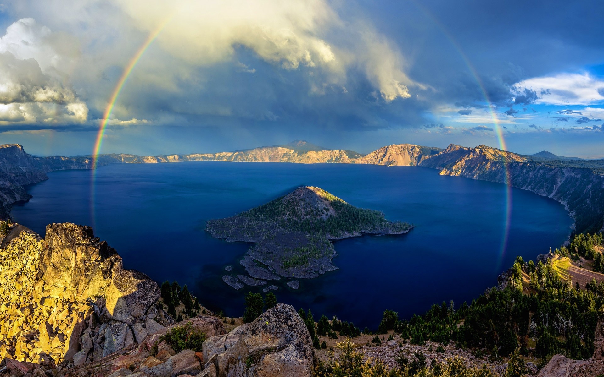 General 1920x1200 rainbows island lake forest mountains clouds cliff water blue nature landscape Crater Lake (Oregon) USA Oregon