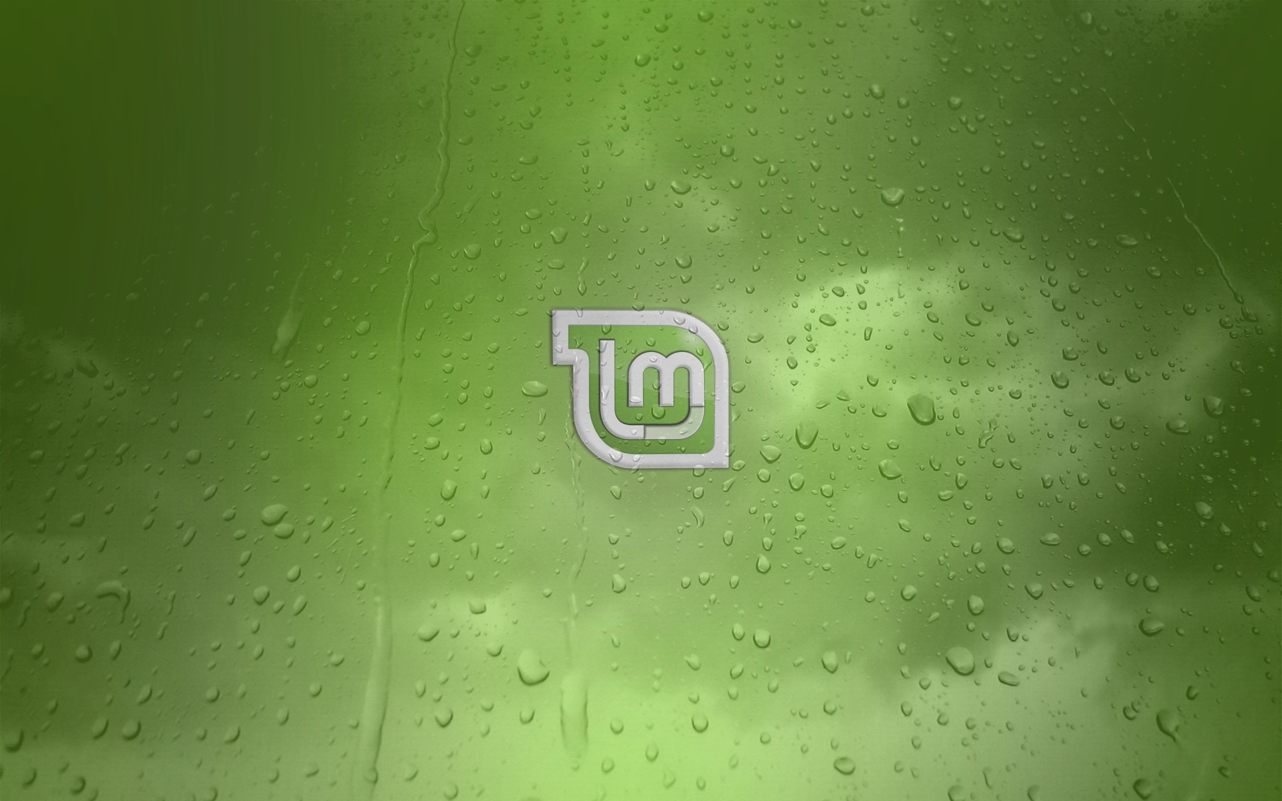 General 2560x1600 logo green background water drops Linux Mint operating system