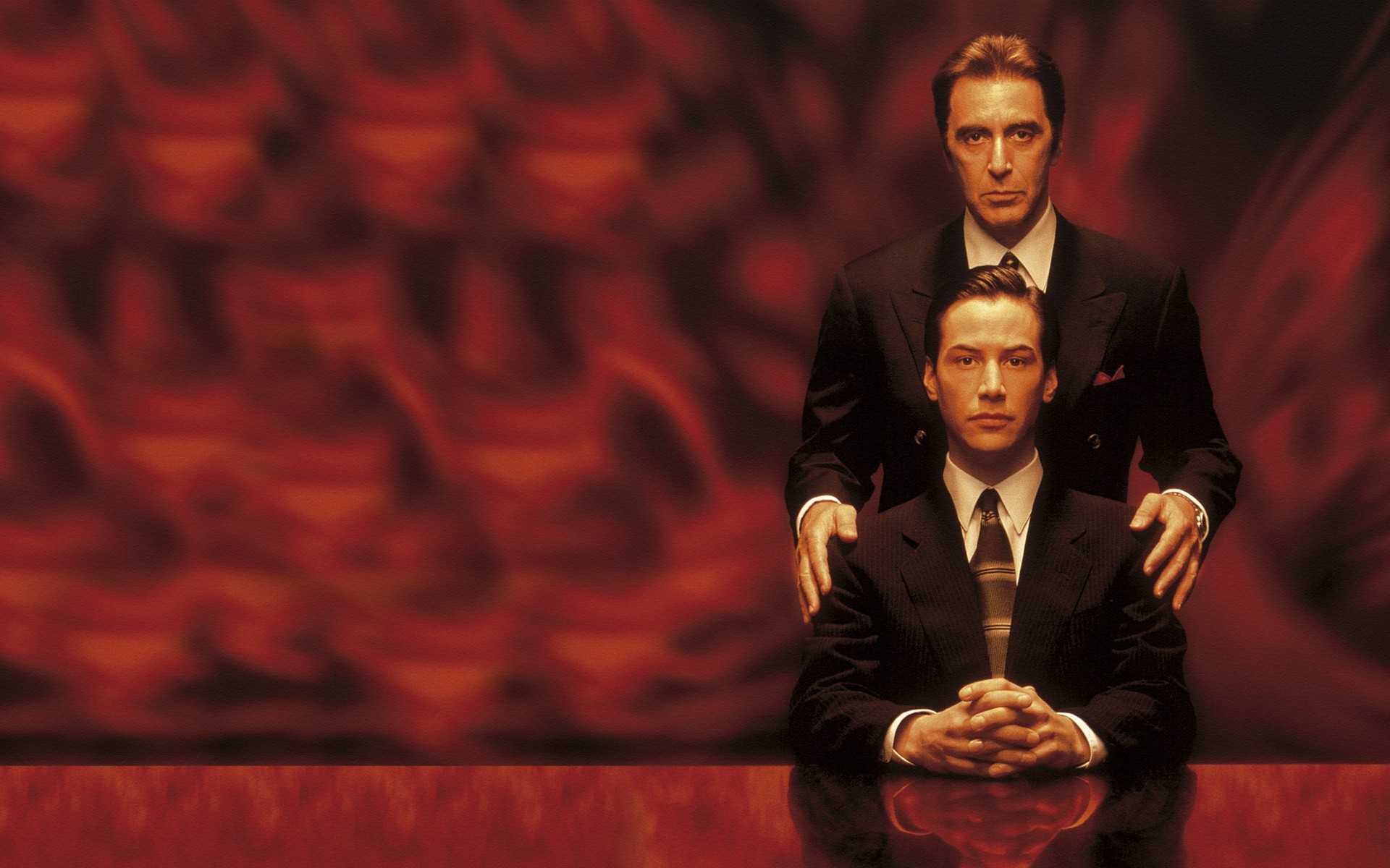 People 1920x1200 men actor film stills suits tie Al Pacino Keanu Reeves fire devil Satan burning movie poster looking at viewer The Devil's Advocate (Movie) red background