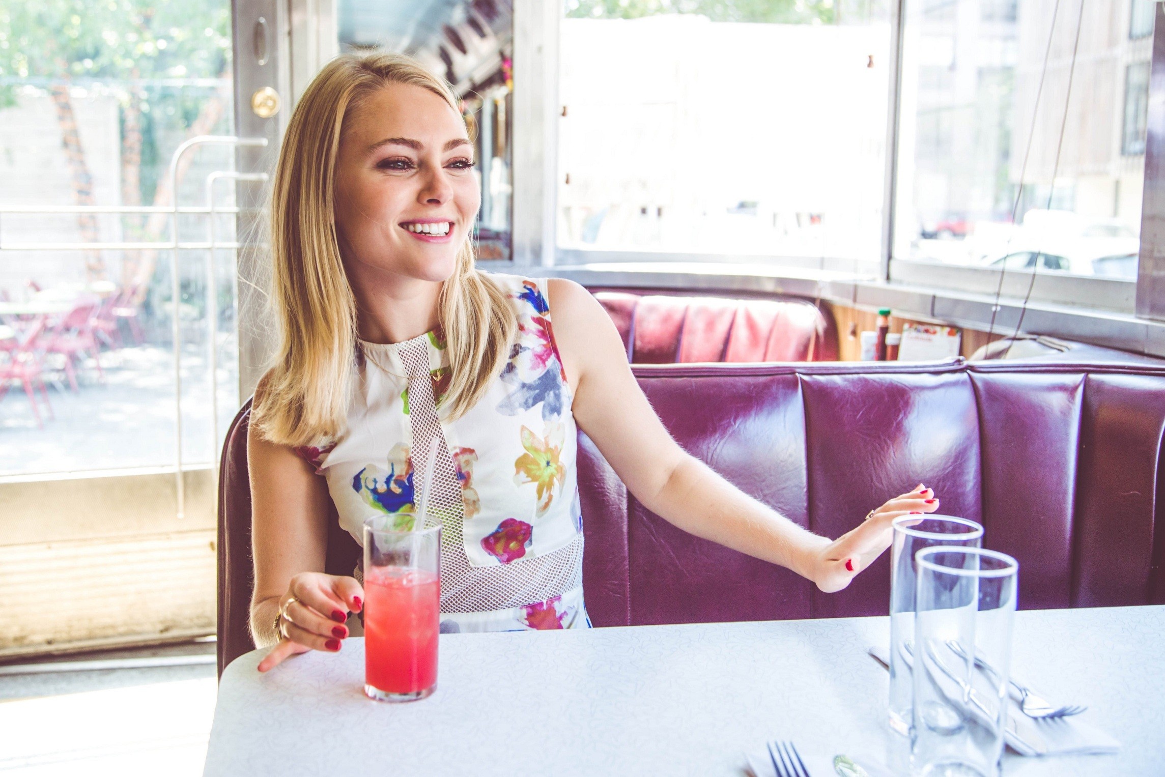 People 2289x1527 AnnaSophia Robb women blonde smiling American women drinking glass red nails painted nails diner dress happy sitting women indoors indoors actress