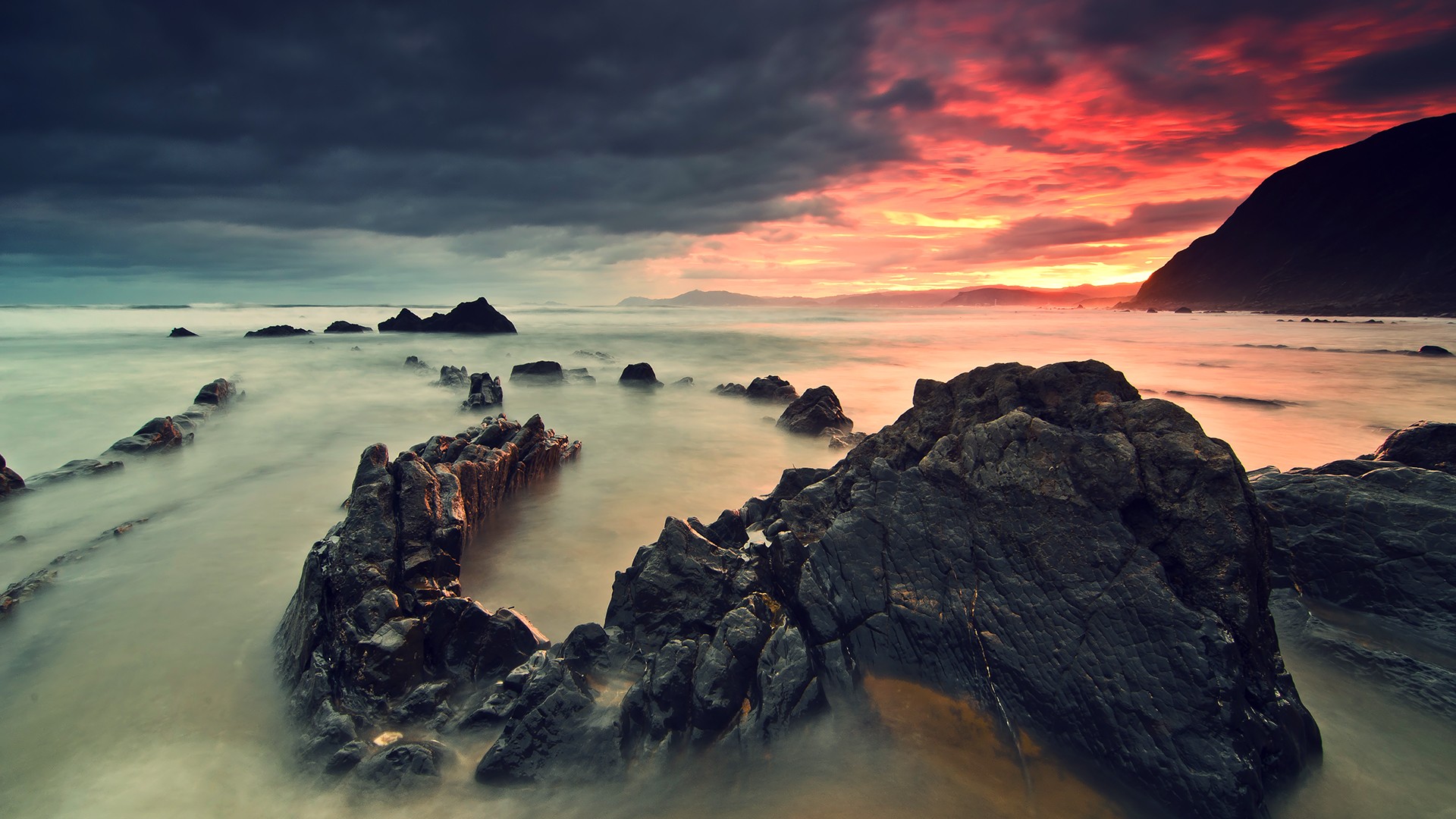 General 1920x1080 rocks nature sunset mist HDR coast long exposure stones sea sunlight clouds