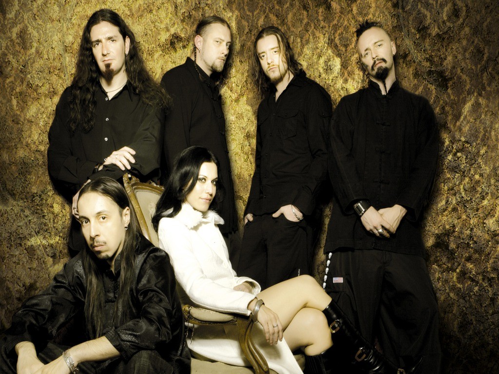 People 1024x768 music Lacuna Coil Cristina Scabbia Italian band women men sitting dark hair women indoors men indoors looking at viewer