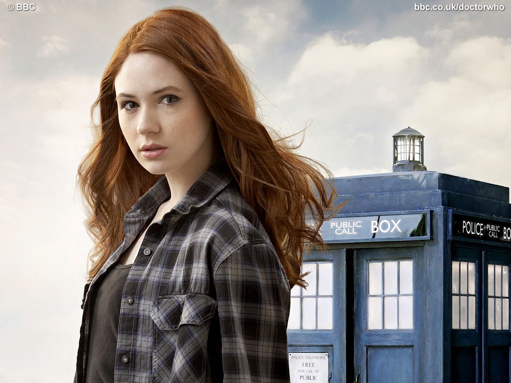 People 1024x768 Karen Gillan Doctor Who TARDIS Amy Pond women actress redhead plaid shirt hair blowing in the wind British women TV series science fiction long hair looking at viewer BBC