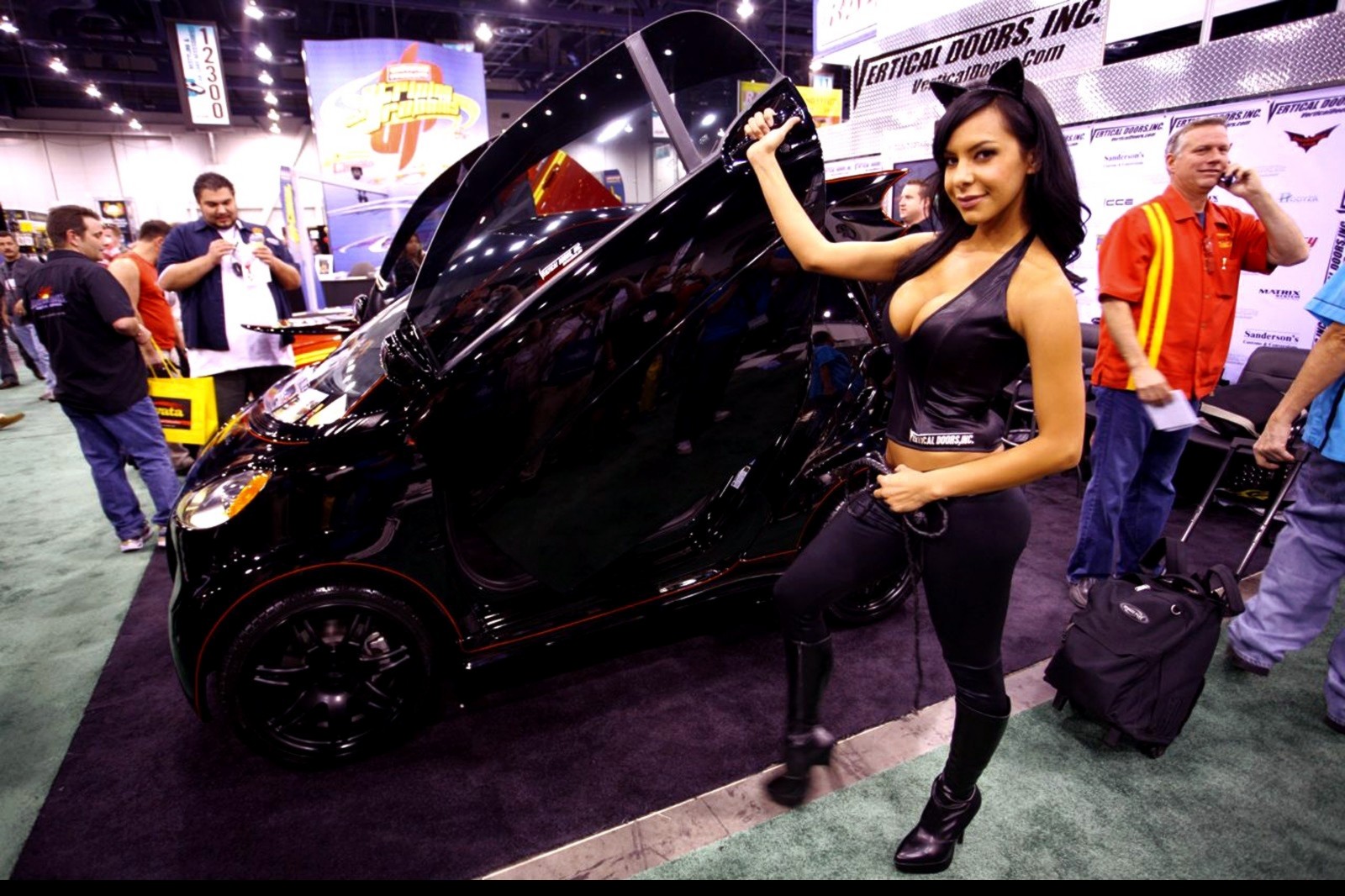 People 1600x1066 car women with cars promomodels women black clothing cat ears cleavage vehicle boobs standing black cars looking at viewer