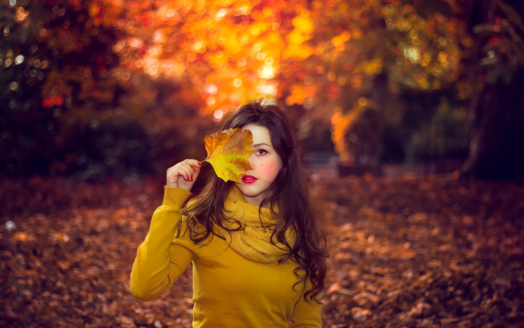 People 1680x1050 women seasons women outdoors leaves fall brunette red lipstick long hair makeup yellow sweater sweater yellow clothing looking at viewer painted nails red nails fallen leaves