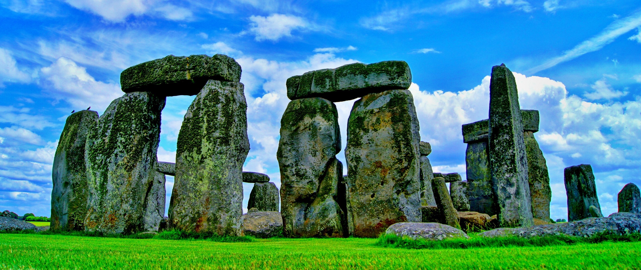 General 2560x1080 Stonehenge  stones stone circle ancient monuments moss history outdoors landmark World Heritage Site