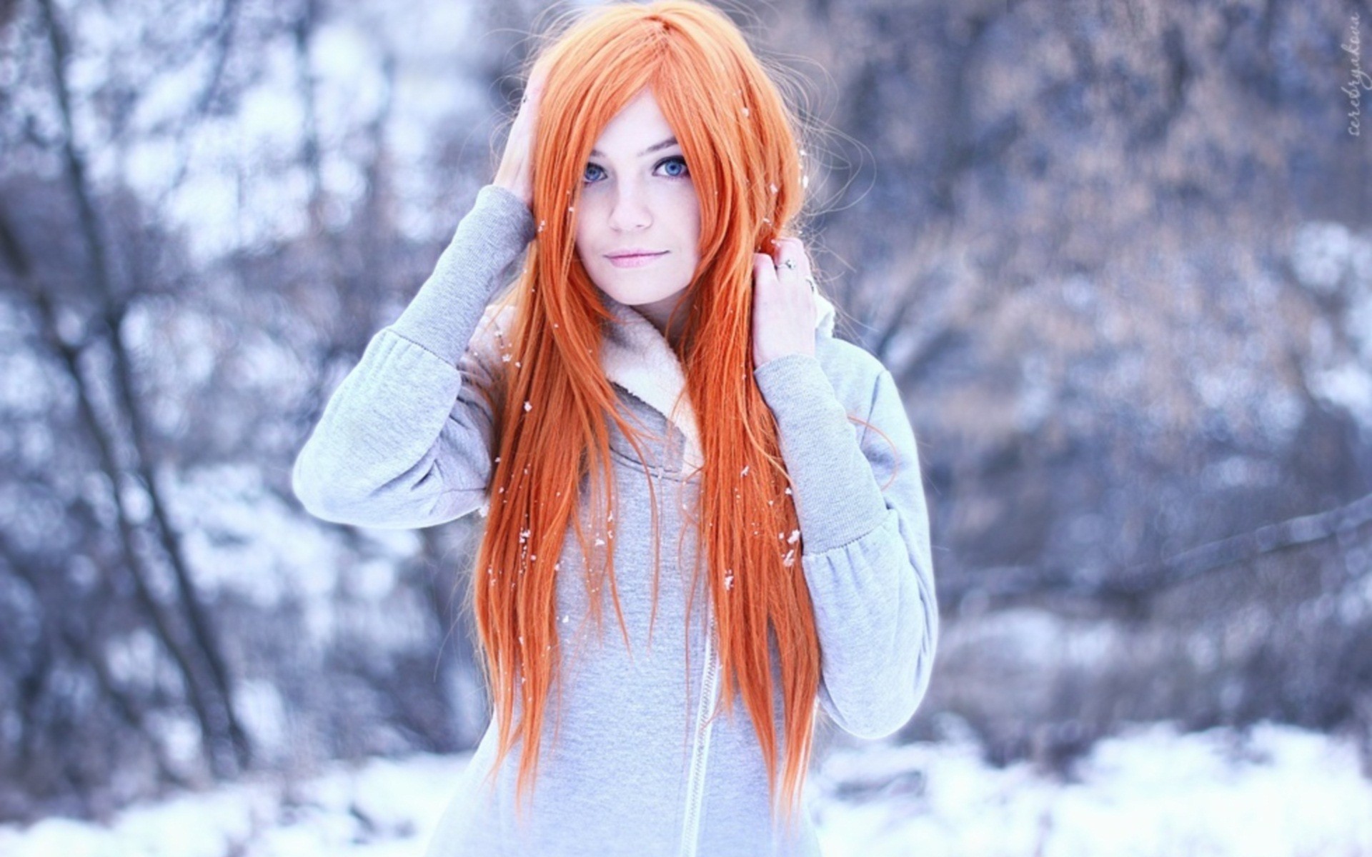People 1920x1200 redhead winter women women outdoors long hair pale bokeh blue eyes looking at viewer snow grey clothing straight hair grey coat coats outdoors cold dyed hair