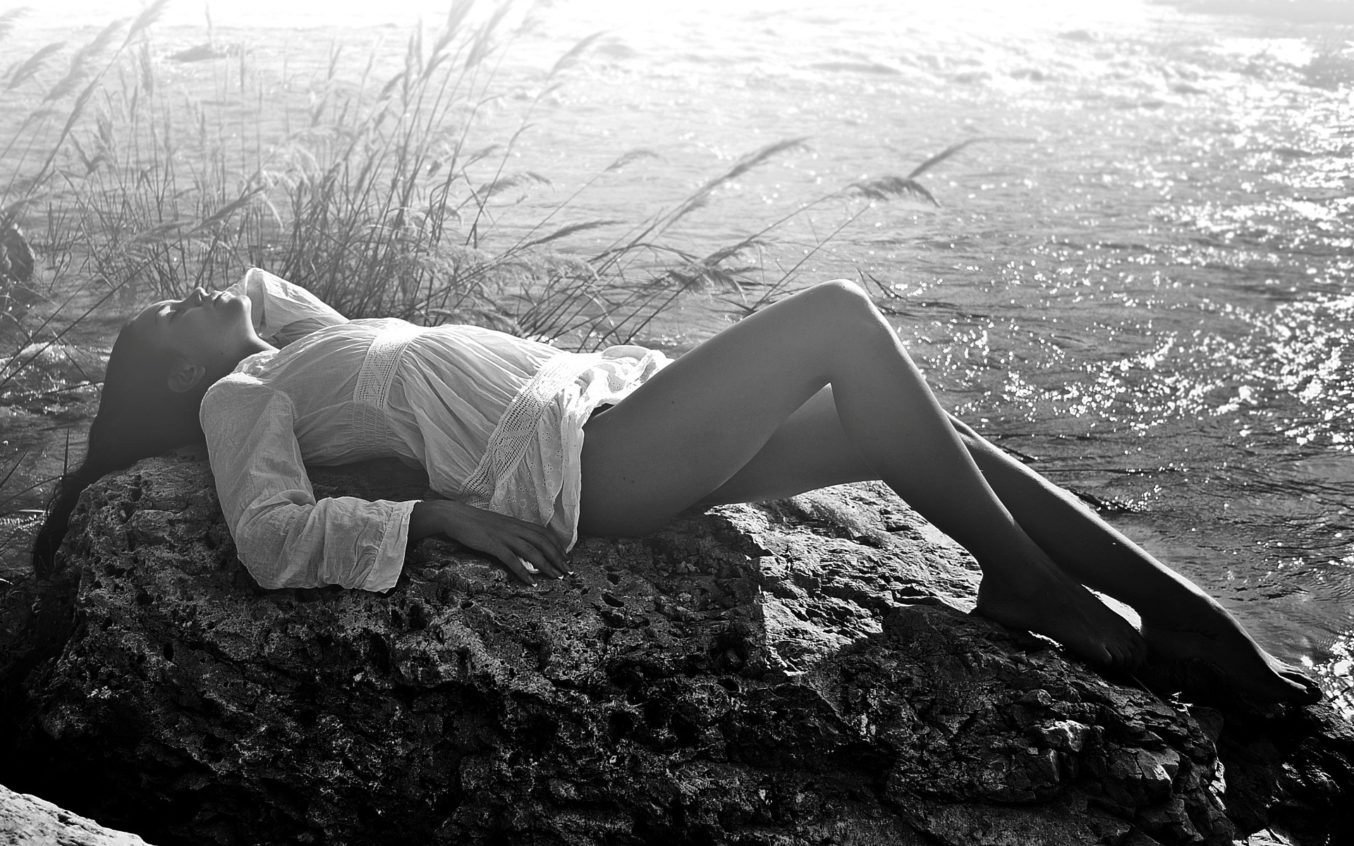 People 1920x1200 women monochrome lying down legs women outdoors water closed eyes model barefoot stones rocks lying on back brunette