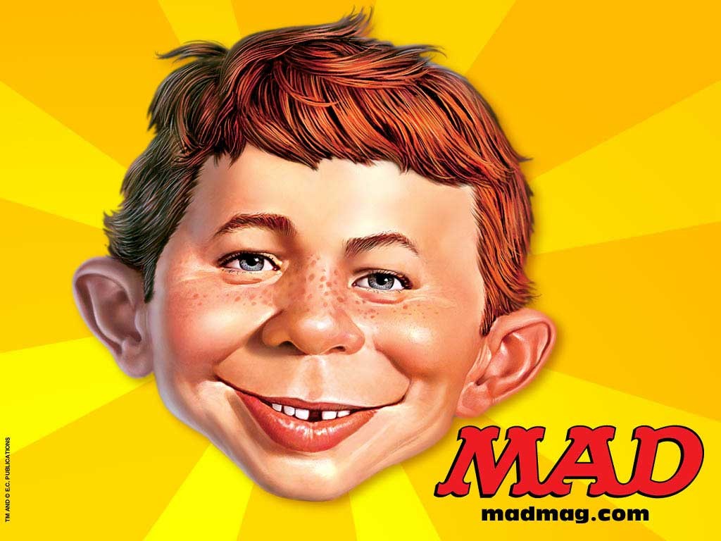 General 1024x768 Mad Magazine face cartoon closeup simple background watermarked freckles text yellow background