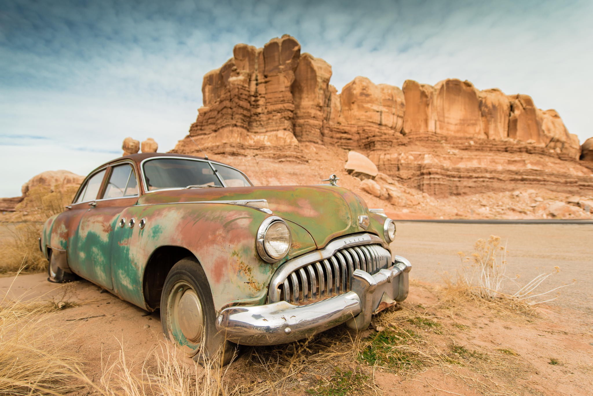 General 2048x1367 car wreck rock formation desert dirt sand rust vehicle rocks old car Buick