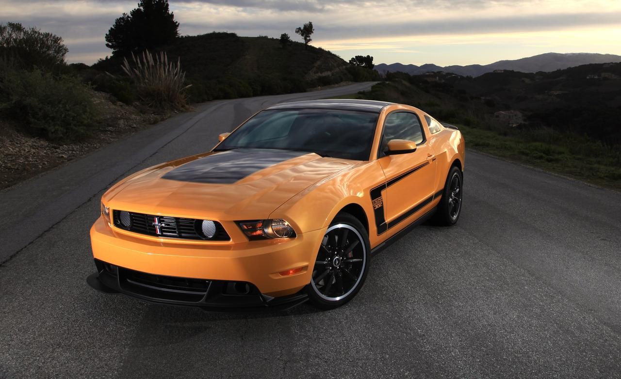 General 1280x782 Ford Mustang Ford American cars muscle cars orange cars vehicle asphalt road Ford Mustang S-197 II car