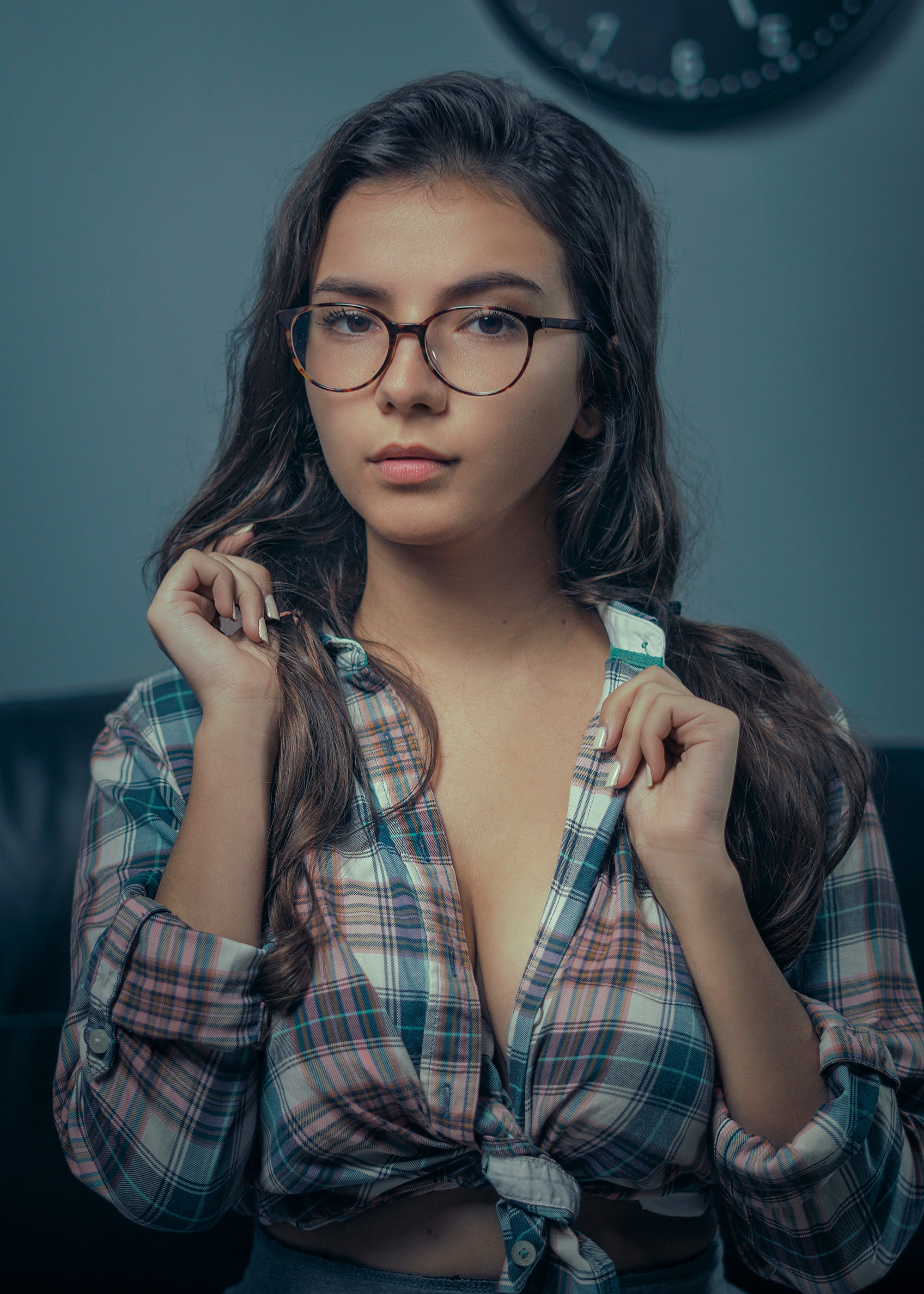People 2000x2800 Catarina Antunes women model brunette long hair glasses shirt plaid shirt checkered plaid plaid clothing sitting thick eyebrows couch closeup face Igor Makovsky portrait looking at viewer tied top cleavage women with glasses women indoors portrait display