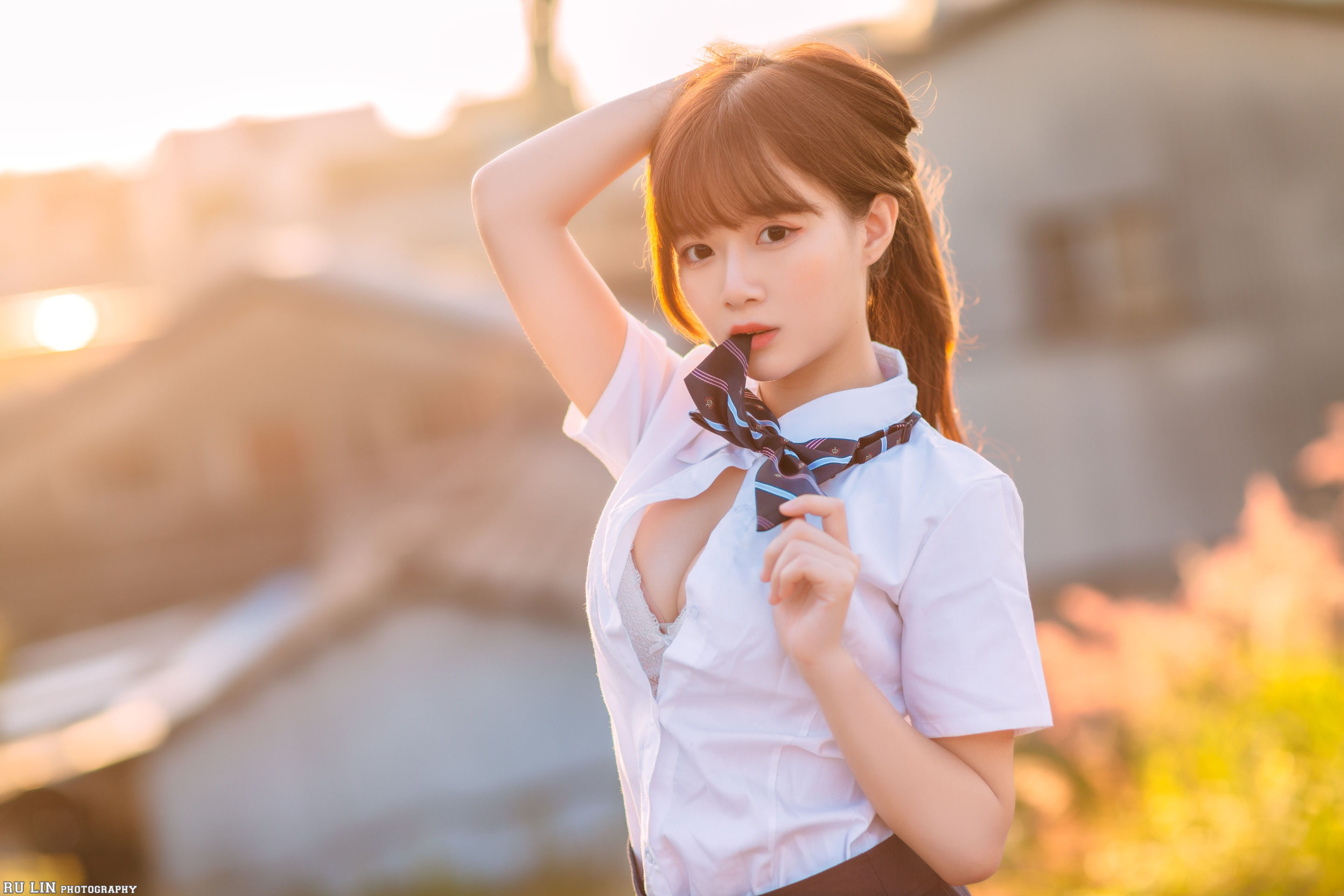 People 2880x1920 Asian school uniform depth of field brunette one arm up white skirt unbuttoned cleavage white bra biting clothes women outdoors outdoors schoolgirl bow tie blurred blurry background model looking at viewer sunset sunset glow open shirt building bra house bangs short sleeves standing women Winnie Qian