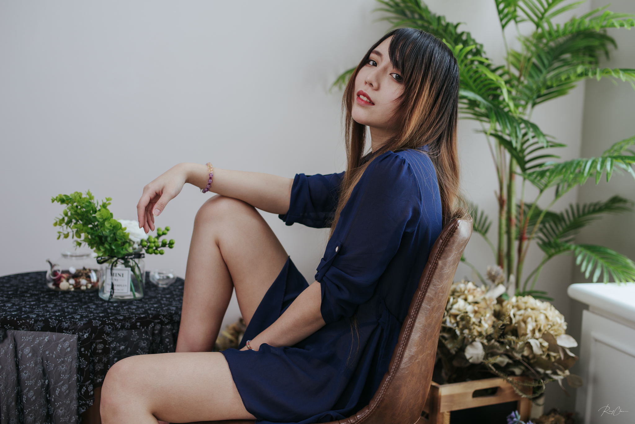 People 2048x1367 women model Asian brunette long hair looking at viewer smiling dress blue dress side view sitting chair depth of field plants indoors women indoors Ray Chen
