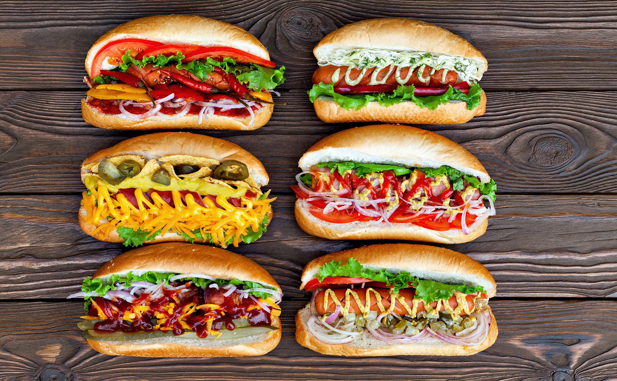 General 2048x1267 food sandwiches hot dogs jalapenos cheese onion tomatoes lettuce chips pepper mustard top view wooden surface closeup