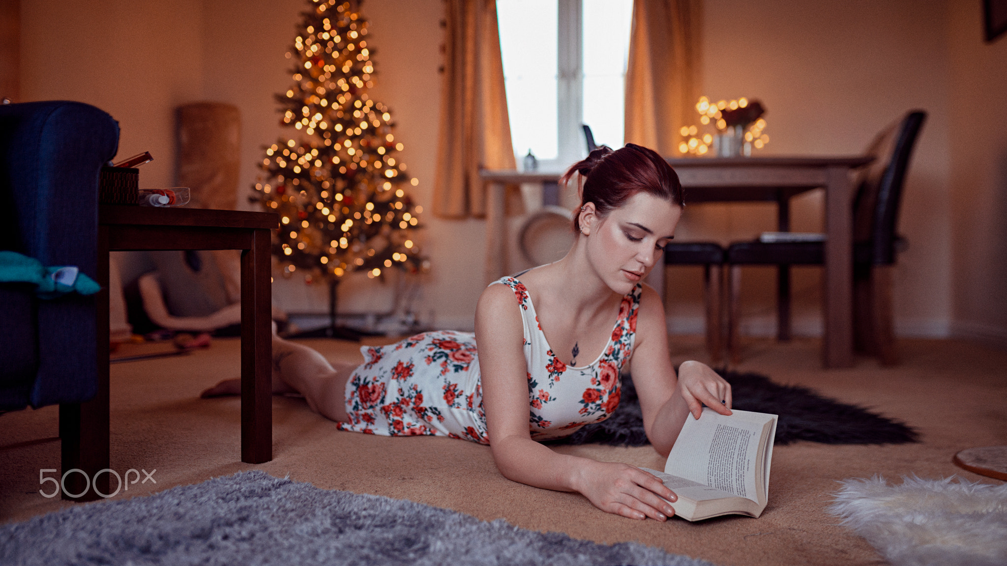 People 2048x1152 Oliver Gibbs 500px photography women model fashion photography flower dress lying on front redhead women indoors hairbun reading