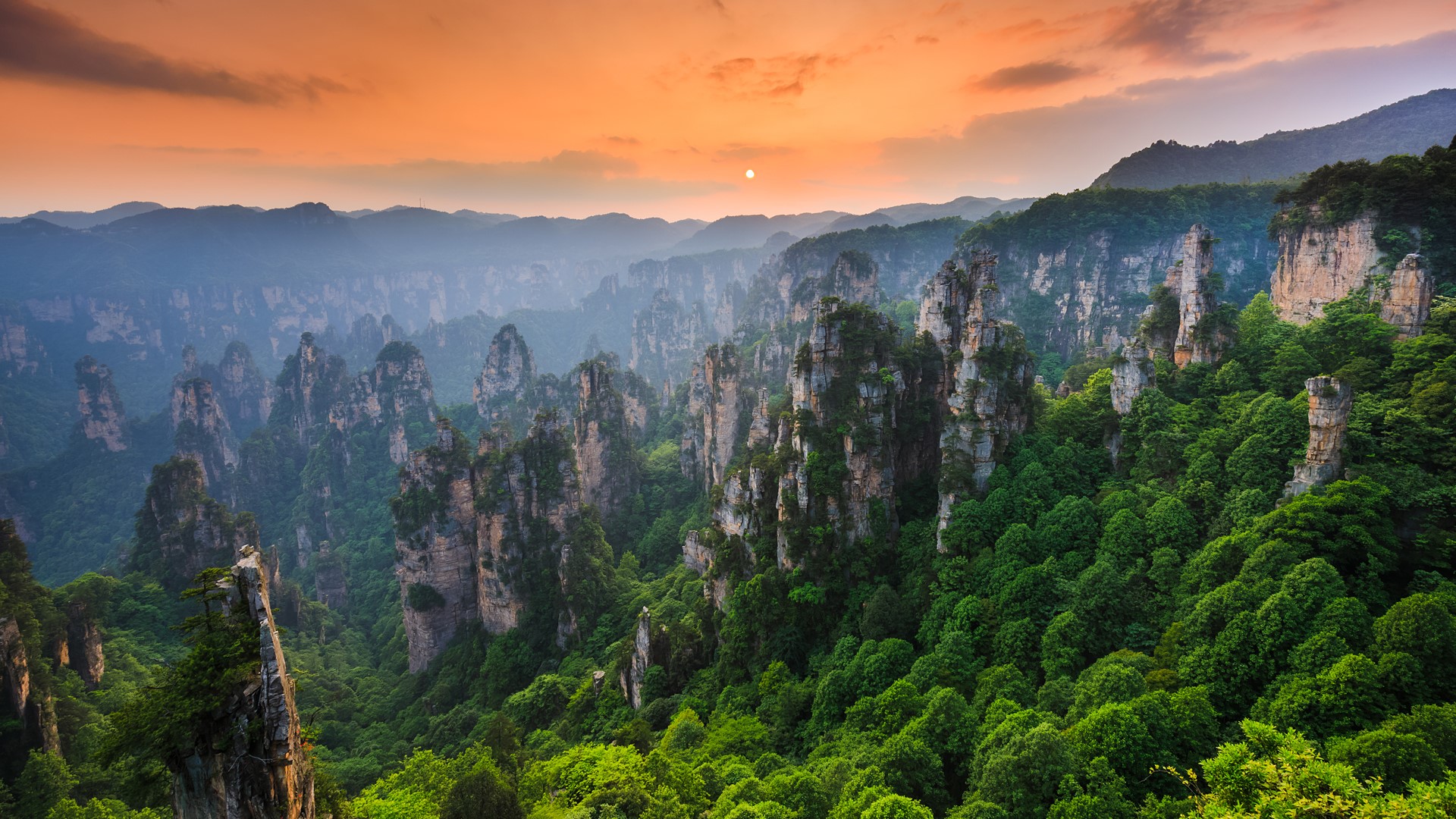 General 1920x1080 nature landscape Sun sunset mountains trees forest rock formation clouds sky Zhangjiajie National Park  Hunan China