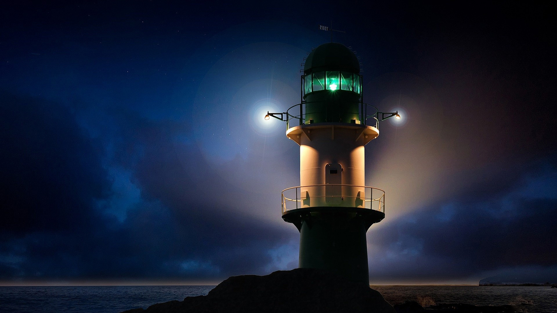 General 1920x1080 lighthouse night lights night sky sky blue sea coast horizon