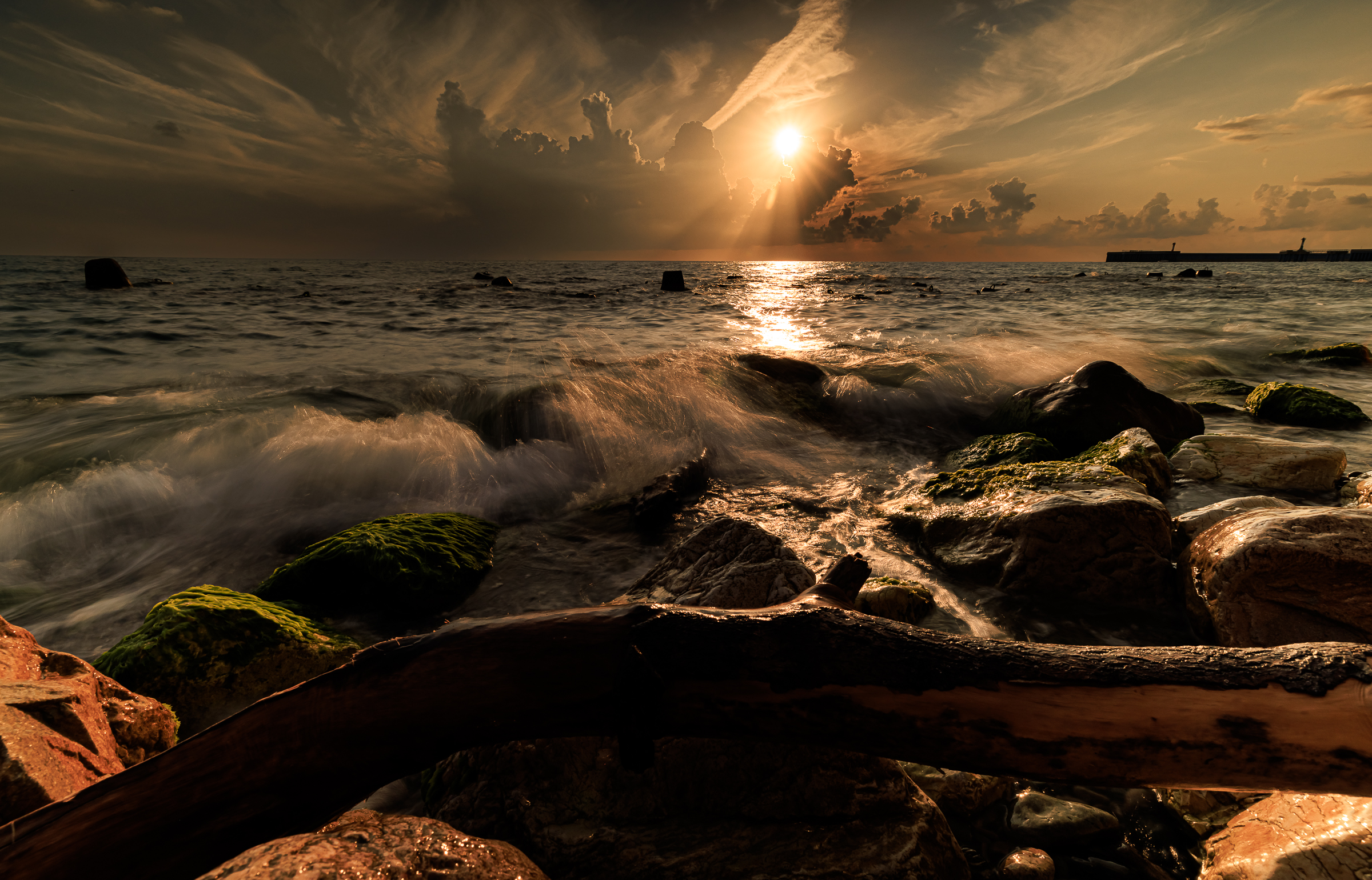 General 2400x1540 waves sunset sea photography outdoors clouds log pier sunlight warm light rocks water sky