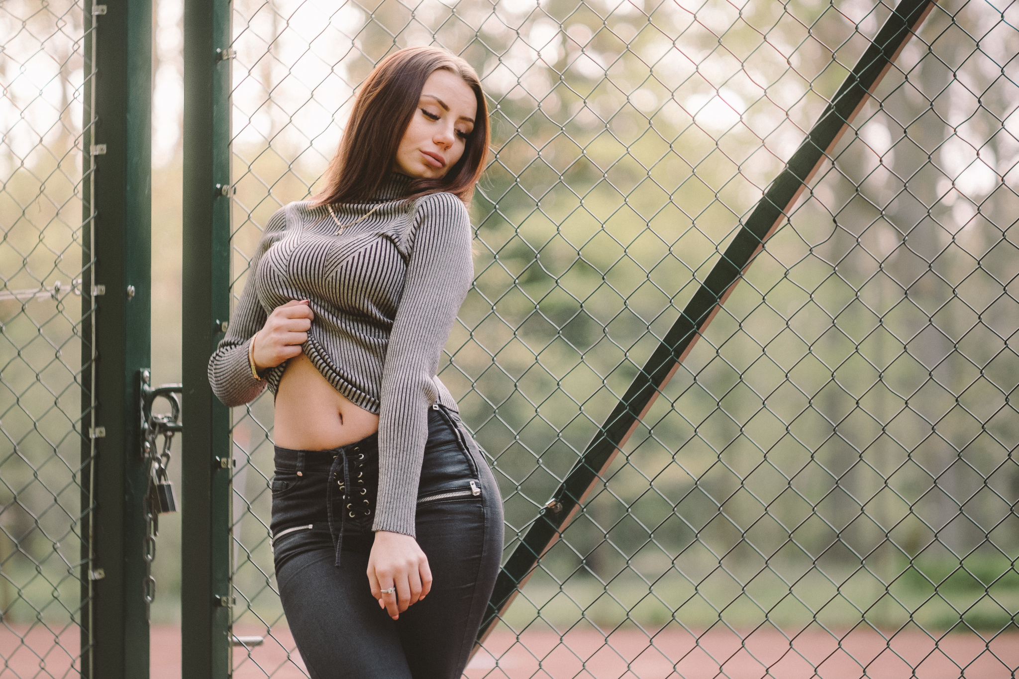 People 2048x1365 women model brunette necklace turtlenecks sweater belly jeans frontal view depth of field fence chain-link Thomas Ohlsson outdoors women outdoors