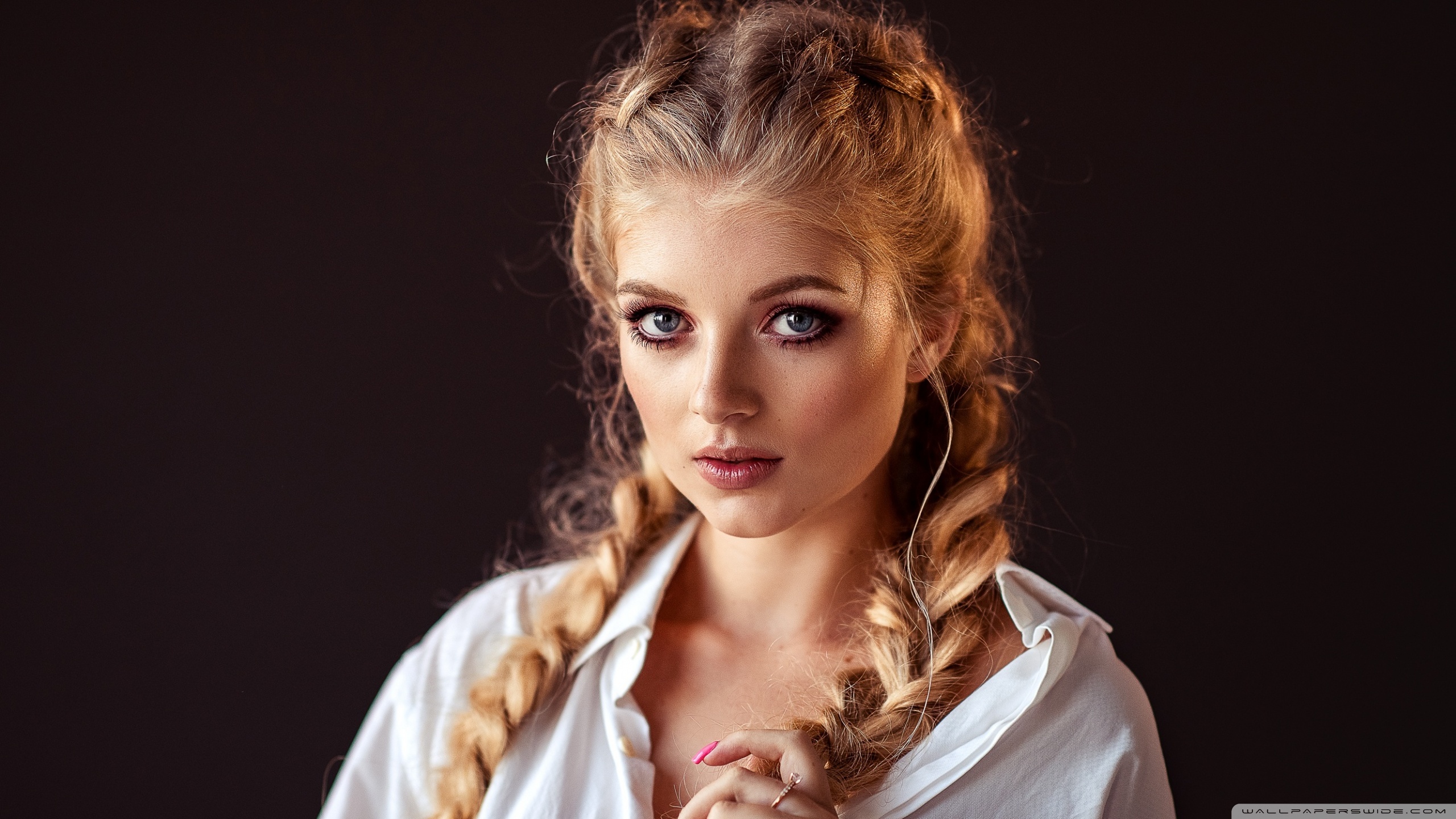 People 2560x1440 women model looking at viewer portrait hair knot face blonde blue eyes touching hair makeup braids