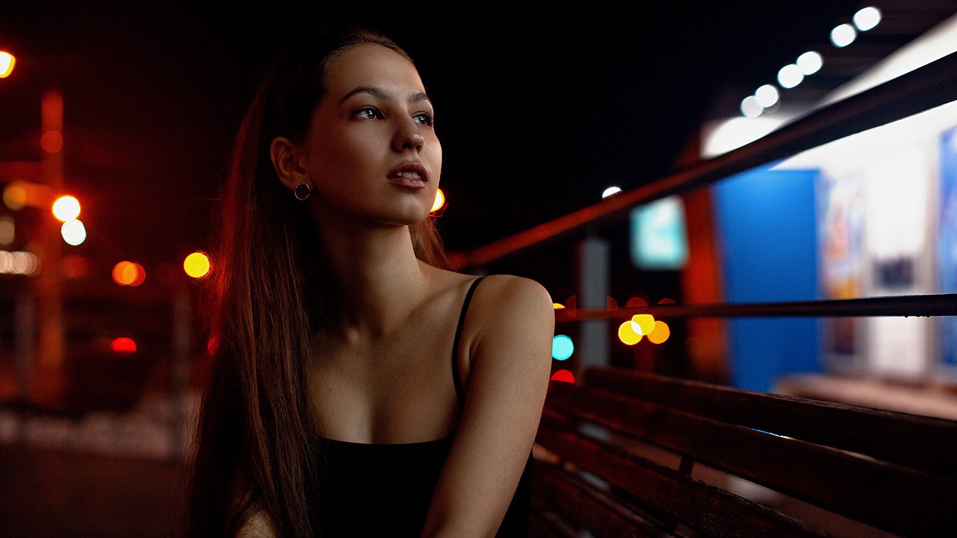 People 1920x1080 model women portrait outdoors looking into the distance face earring ponytail lights dark night black top sitting bench depth of field women outdoors photography brunette