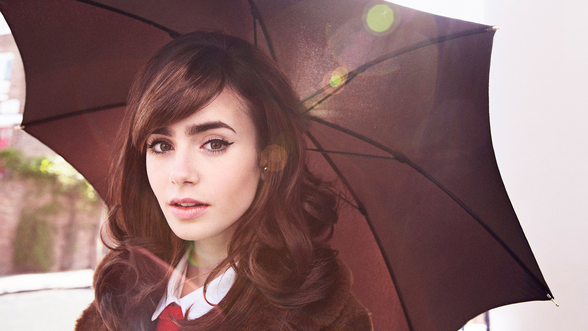 People 1920x1080 Lily Collins women brunette actress celebrity umbrella long eyelashes women outdoors looking at viewer lens flare fur coats glamour pale British women with umbrella young women classy