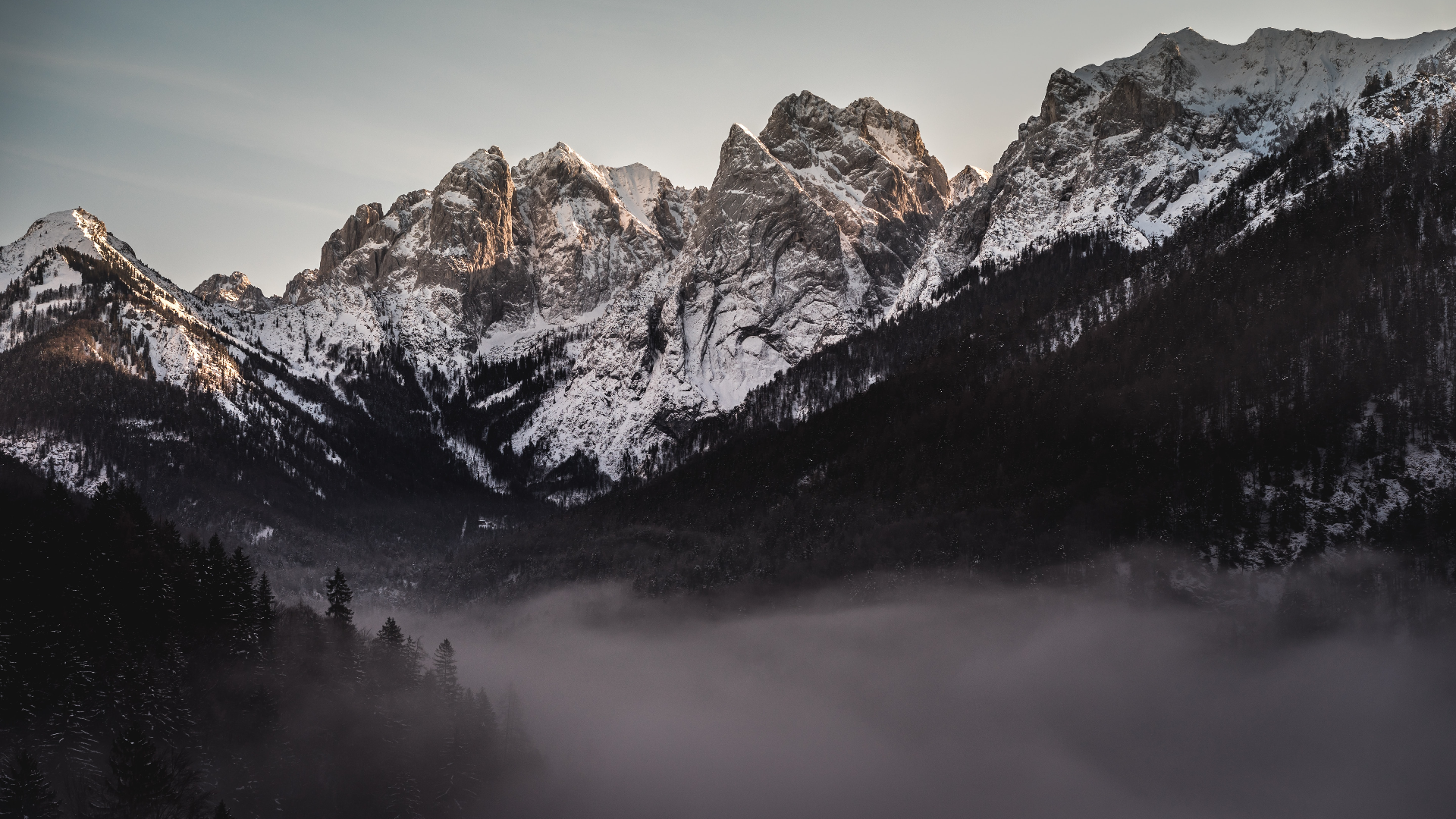 General 1920x1080 nature landscape trees forest dark mist mountains snowy mountain clouds sky sunlight Tyrol Austria