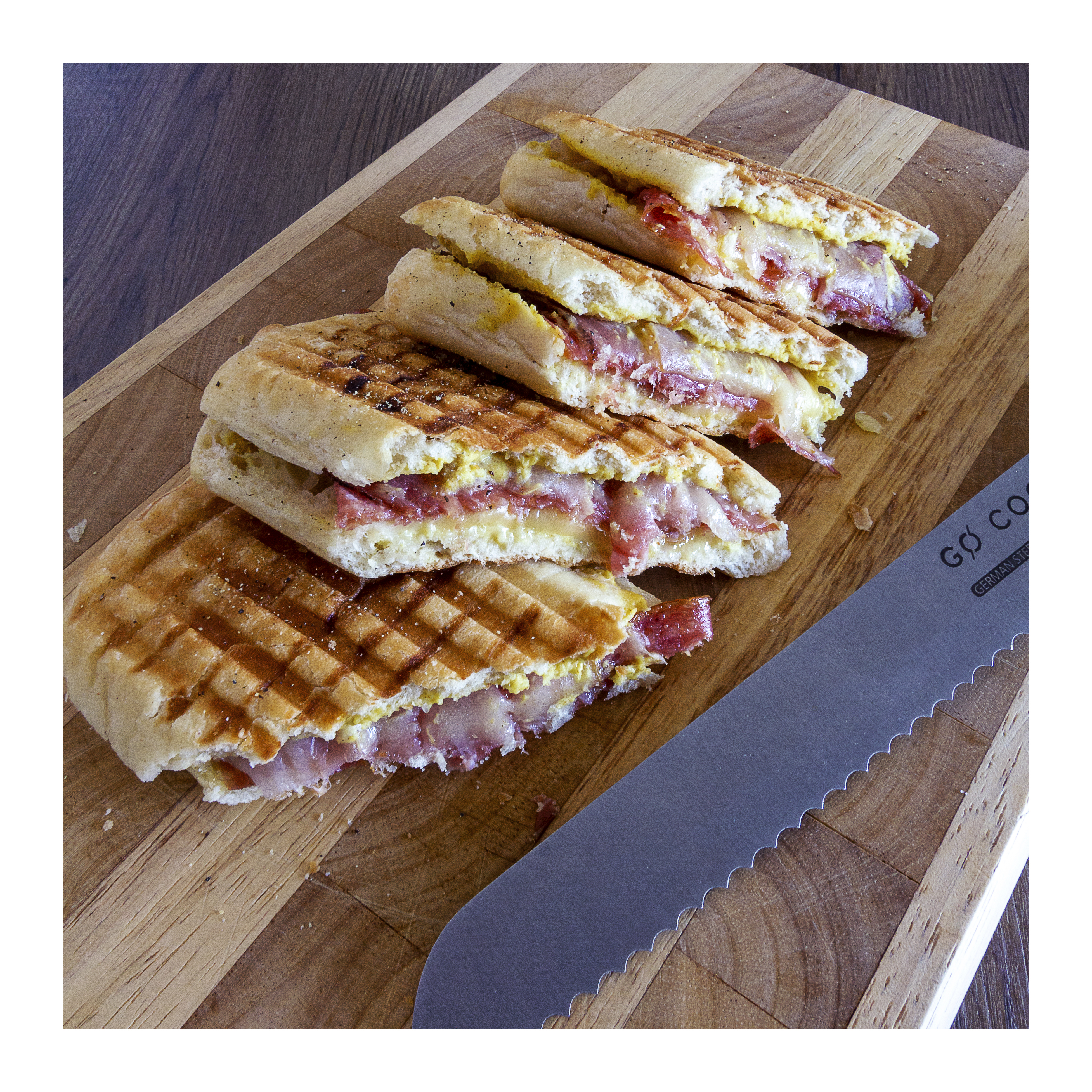 General 3906x3906 panini food food crumbs lunch meat cheese toast cutting board wooden surface closeup photography spices table knife bread