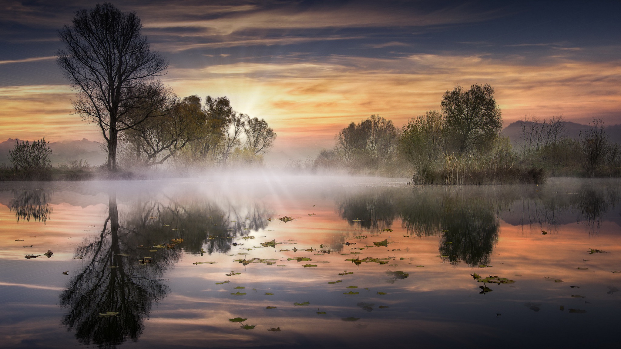 General 2048x1152 outdoors nature landscape mist reflection water calm waters sky sunlight trees