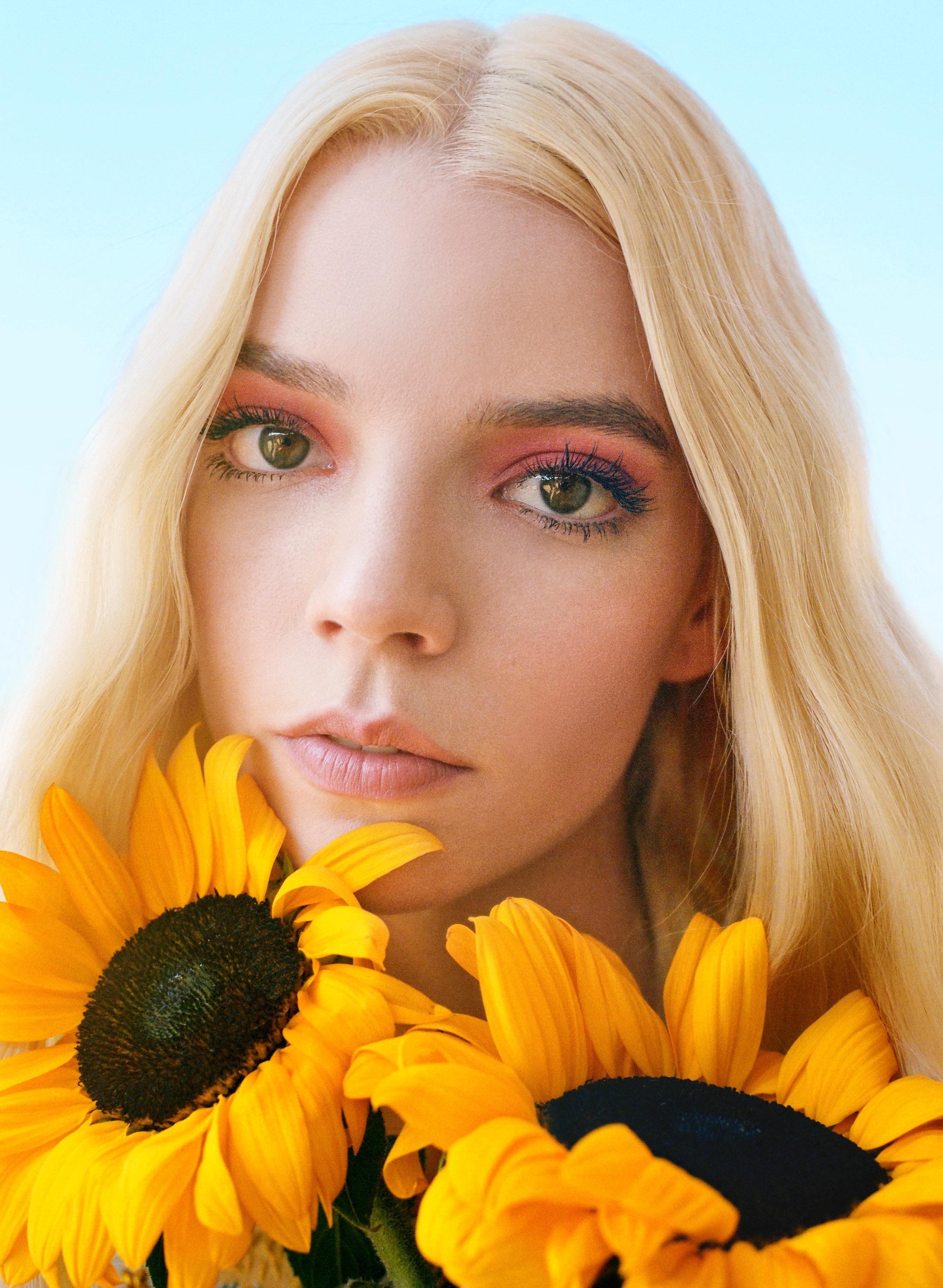 People 2197x3000 Anya Taylor-Joy  actress women looking at viewer sunflowers blonde simple background face