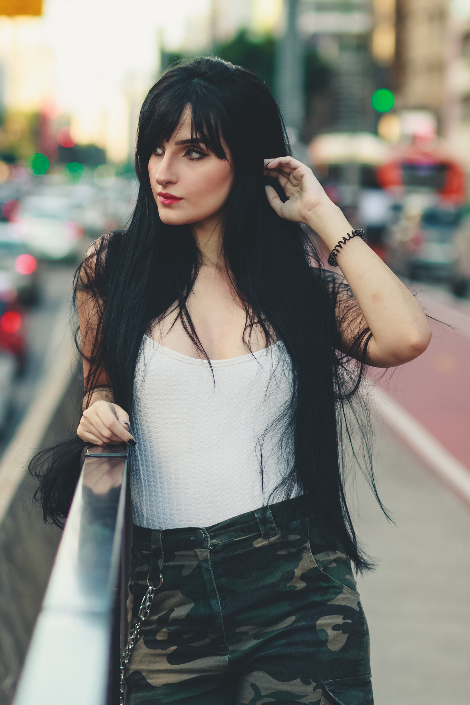 People 1838x2756 women model urban camo pants long hair dark hair depth of field city standing looking into the distance lipstick painted nails women outdoors outdoors looking away makeup