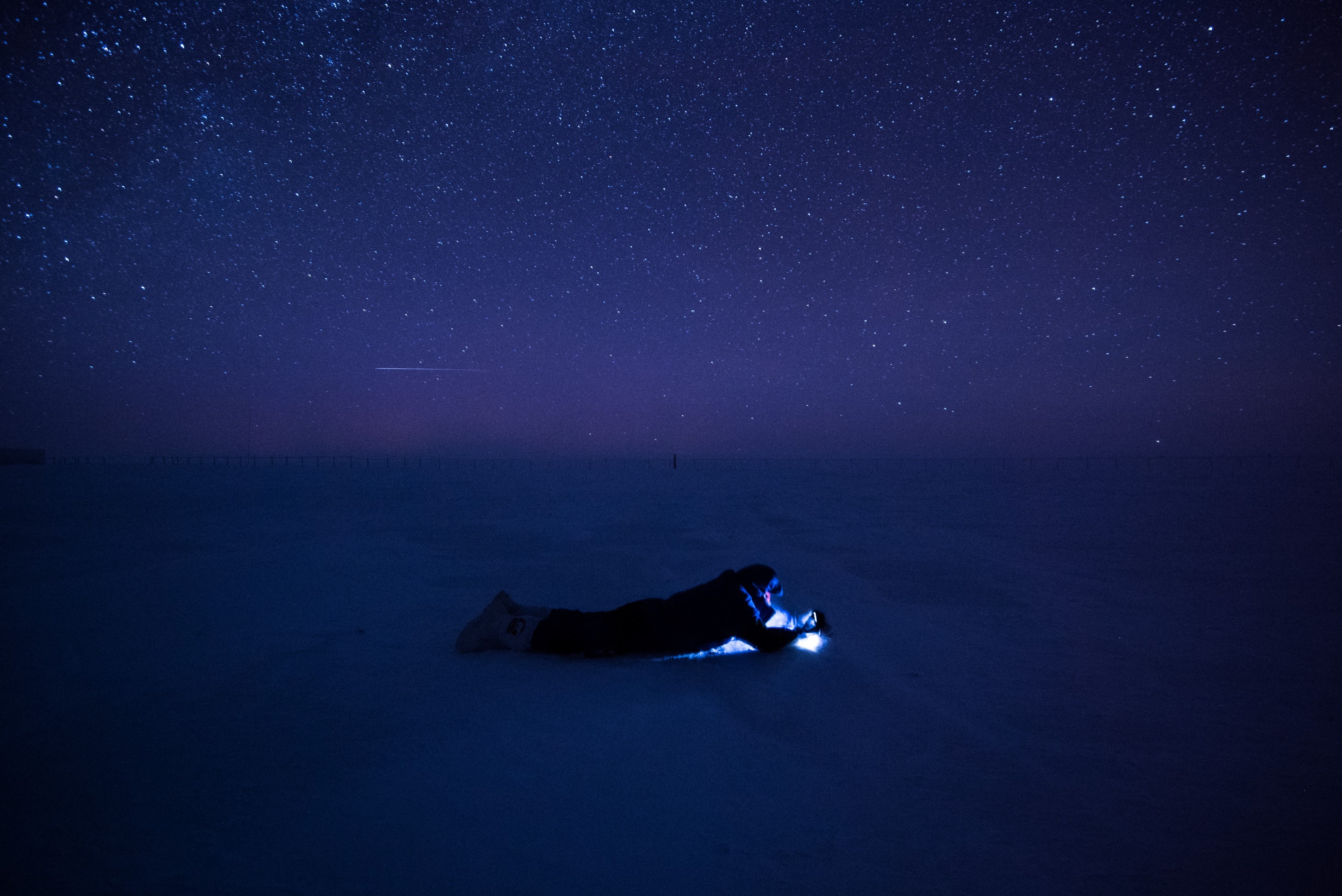 People 2917x1948 nature landscape Concordia Research Station Antarctica snow ice evening men Torchlight lying on front stars long exposure horizon isolation blue low light
