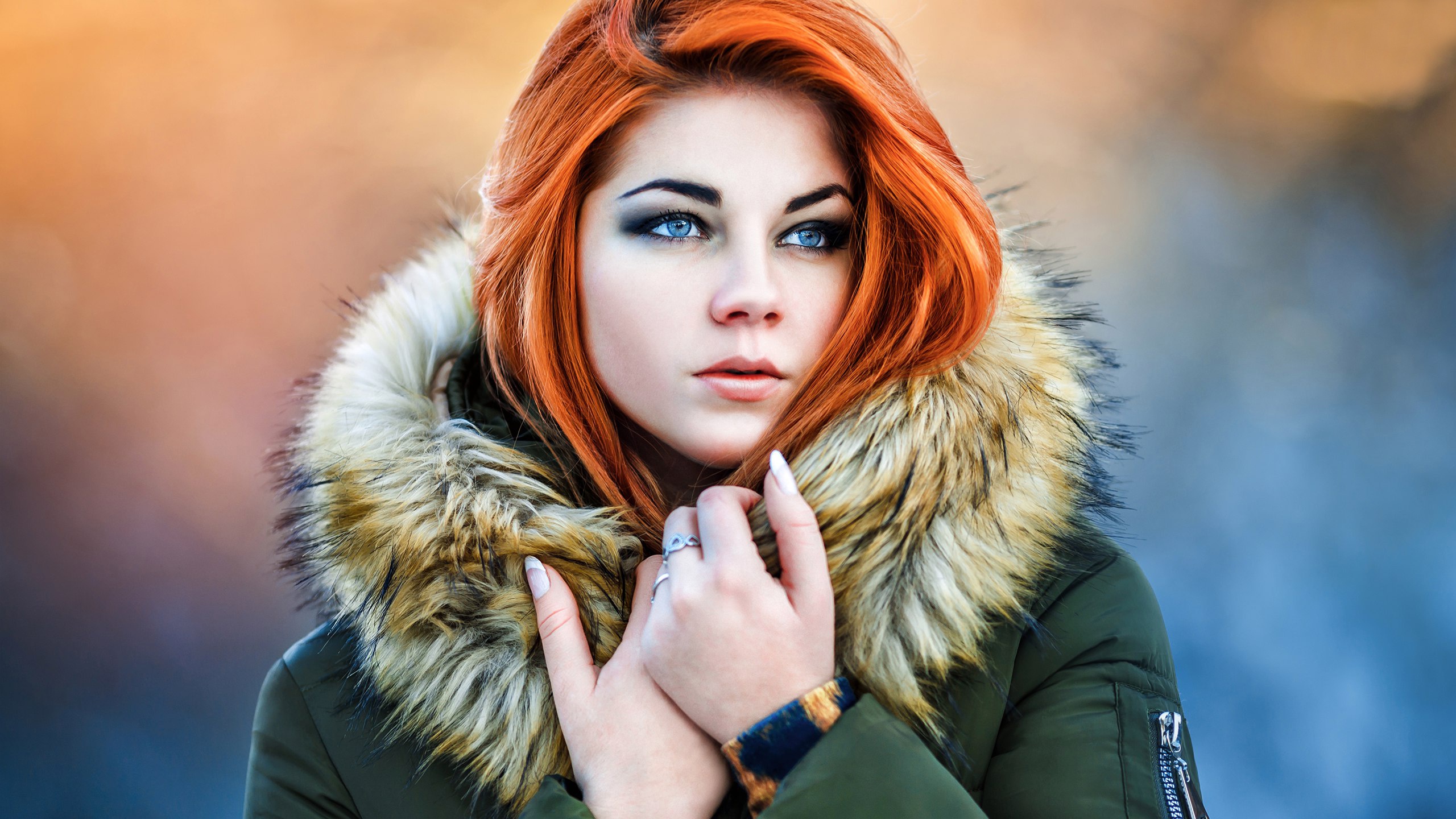 People 2560x1440 women model redhead depth of field fur green jacket jacket looking into the distance looking away blue eyes