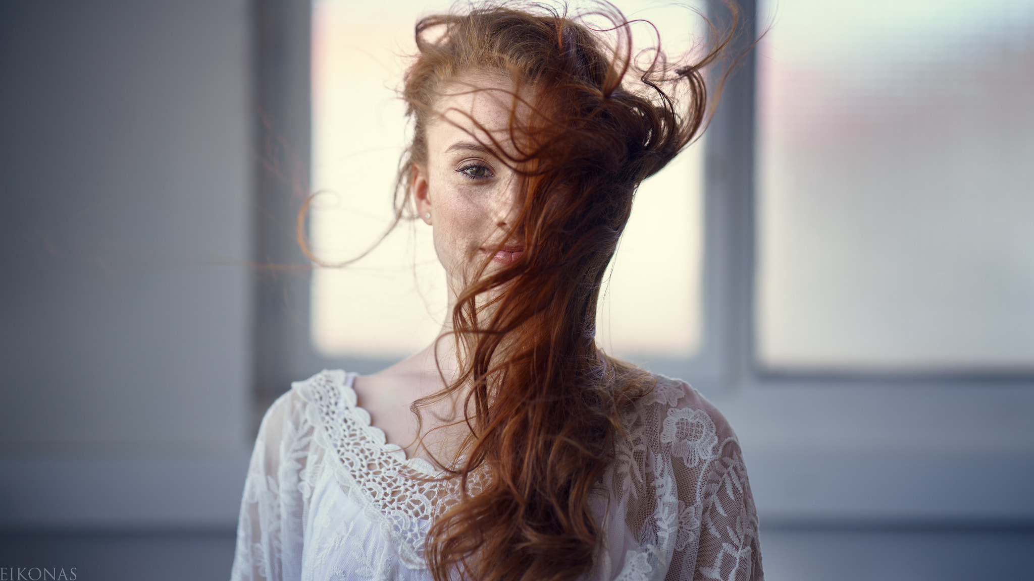 People 2048x1152 women redhead freckles smiling looking at viewer white shirt Eikonas hair blowing in the wind windy watermarked closeup
