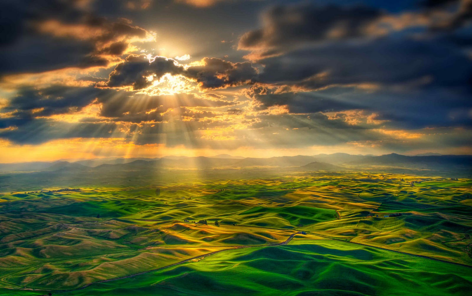 General 1600x1005 photography nature sun rays clouds mountains far view hills ground field sunlight landscape