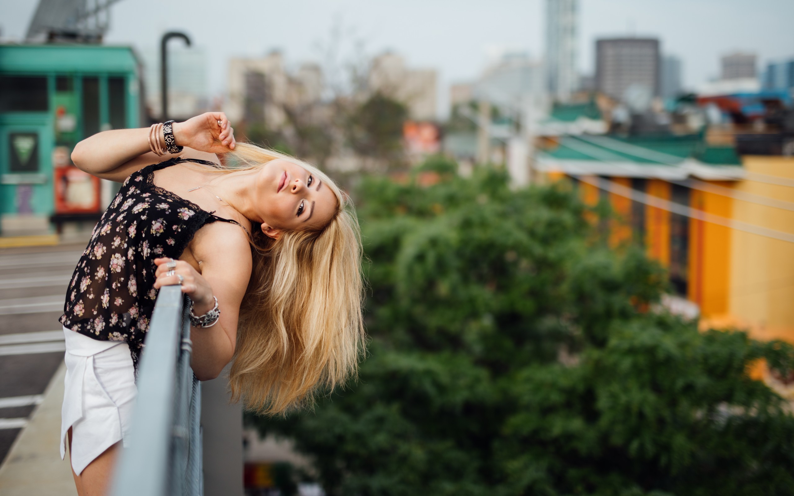 People 2560x1600 women blonde women outdoors long hair looking at viewer tank top miniskirt depth of field hand(s) in hair arched back urban bracelets