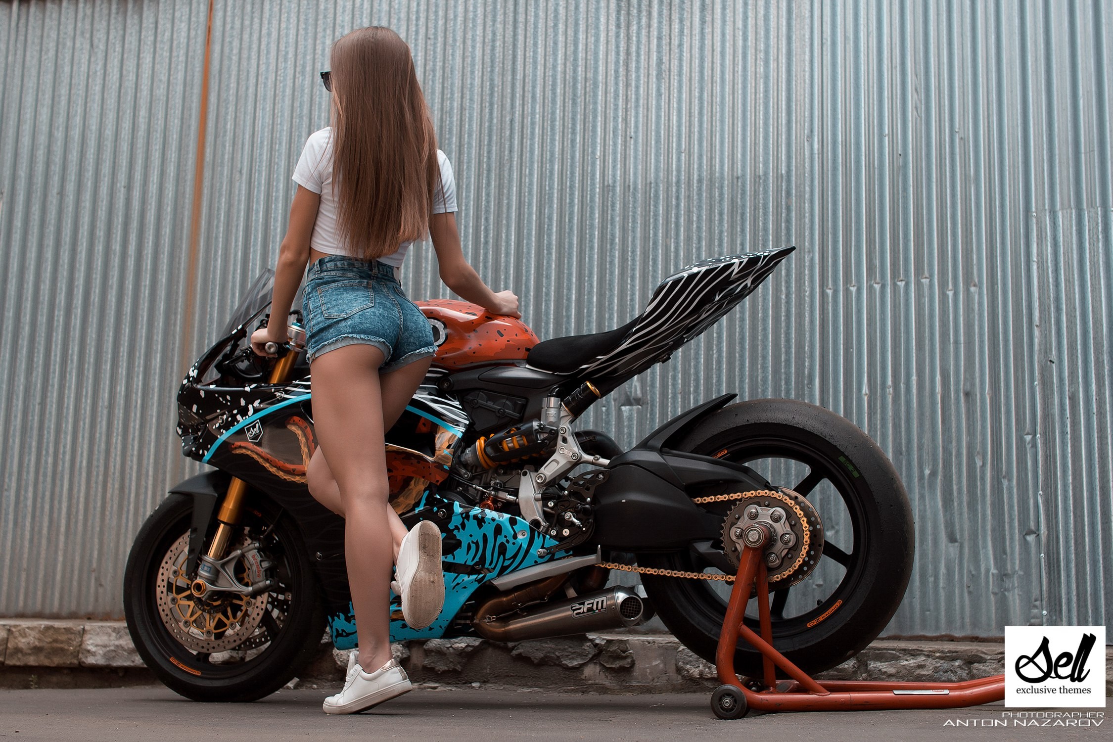 People 2250x1500 Yulia Gerasimova women model jean shorts sneakers motorcycle ass women with motorcycles brunette T-shirt wall Anton Nazarov high waisted high waisted shorts straight hair legs white shoes watermarked