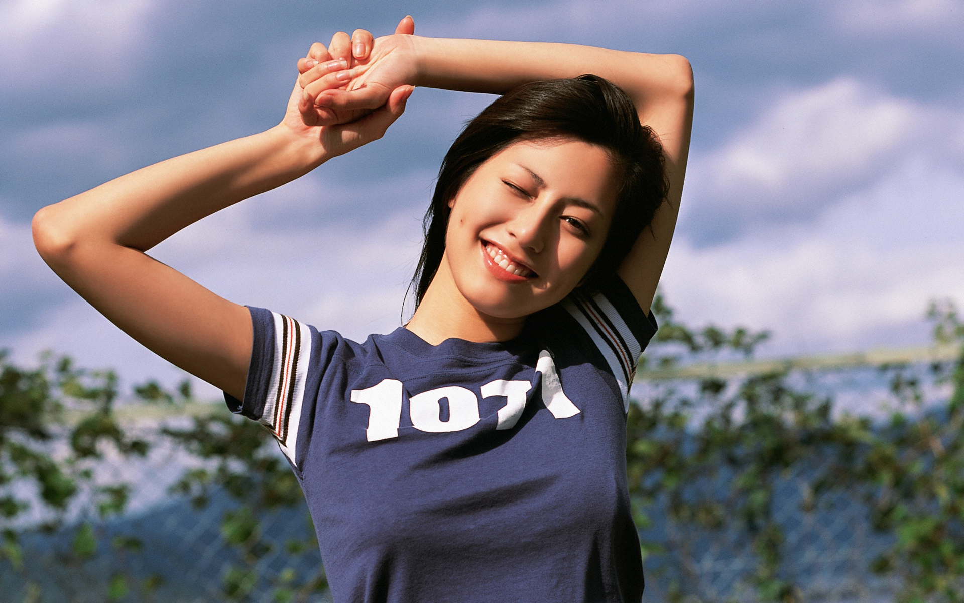 People 1920x1200 Asian women Yumi Sugimoto smiling model wink women outdoors brunette one eye closed numbers printed shirts dark hair face arms up Japanese women