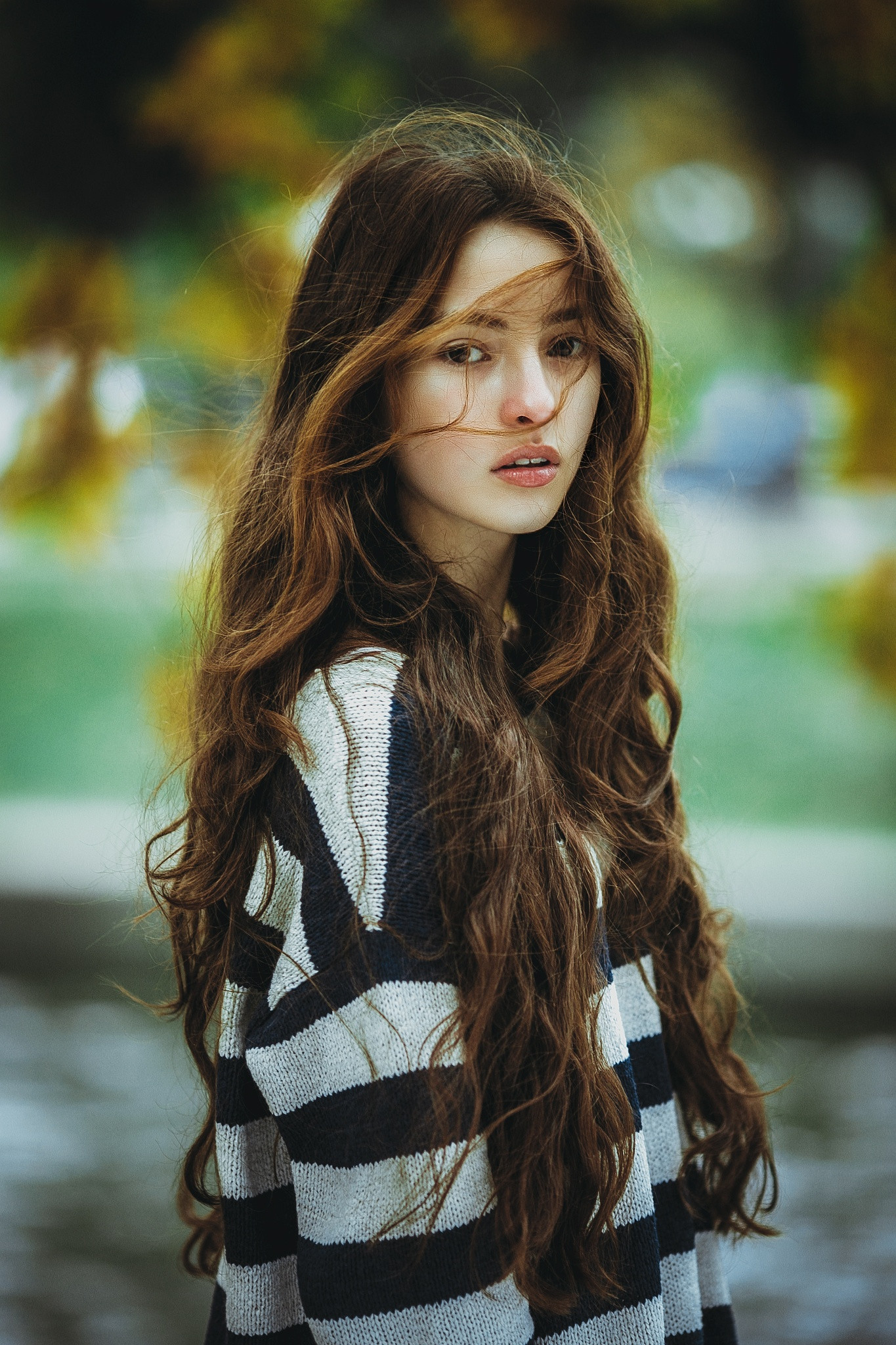 People 1365x2048 women model brunette long hair Asian portrait display women outdoors windy striped clothing sweater open mouth juicy lips depth of field wavy hair Ivan Proskurin hair in face striped sweaters looking at viewer