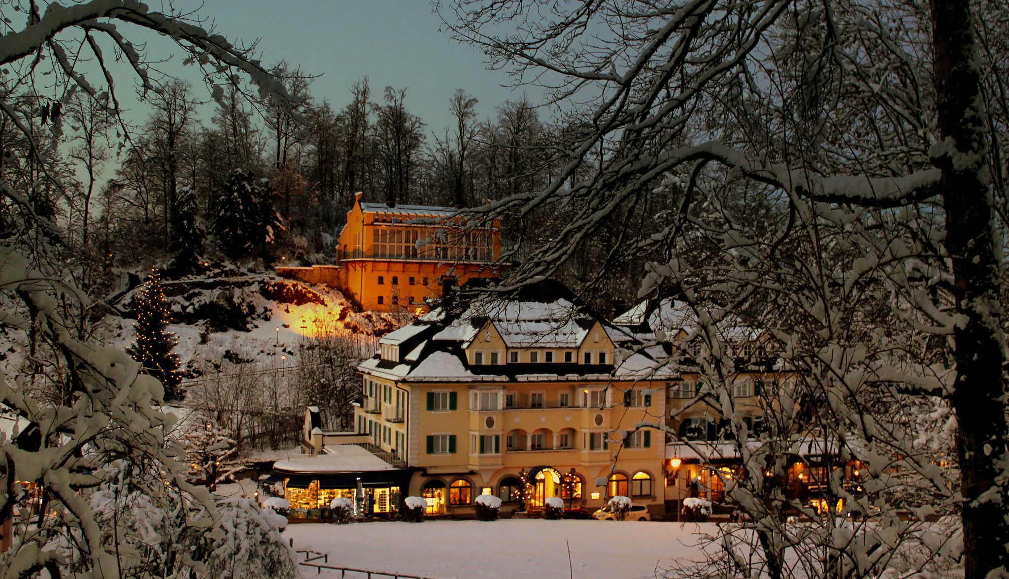 General 2048x1176 architecture castle nature landscape trees forest snow winter branch lights hotel Germany