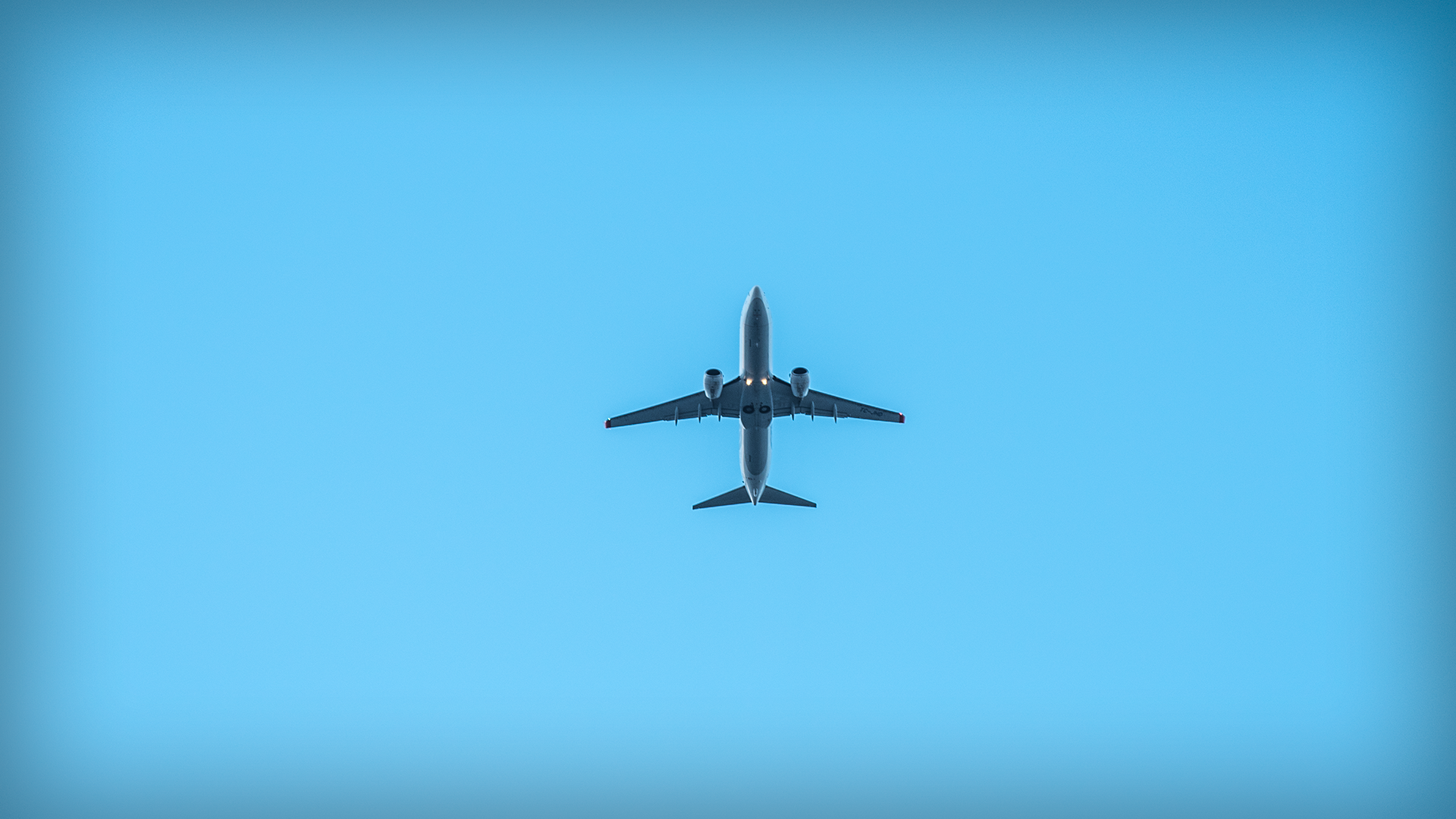 General 1920x1080 airplane Tourism sky blue cyan minimalism aircraft cyan background clear sky vehicle passenger aircraft