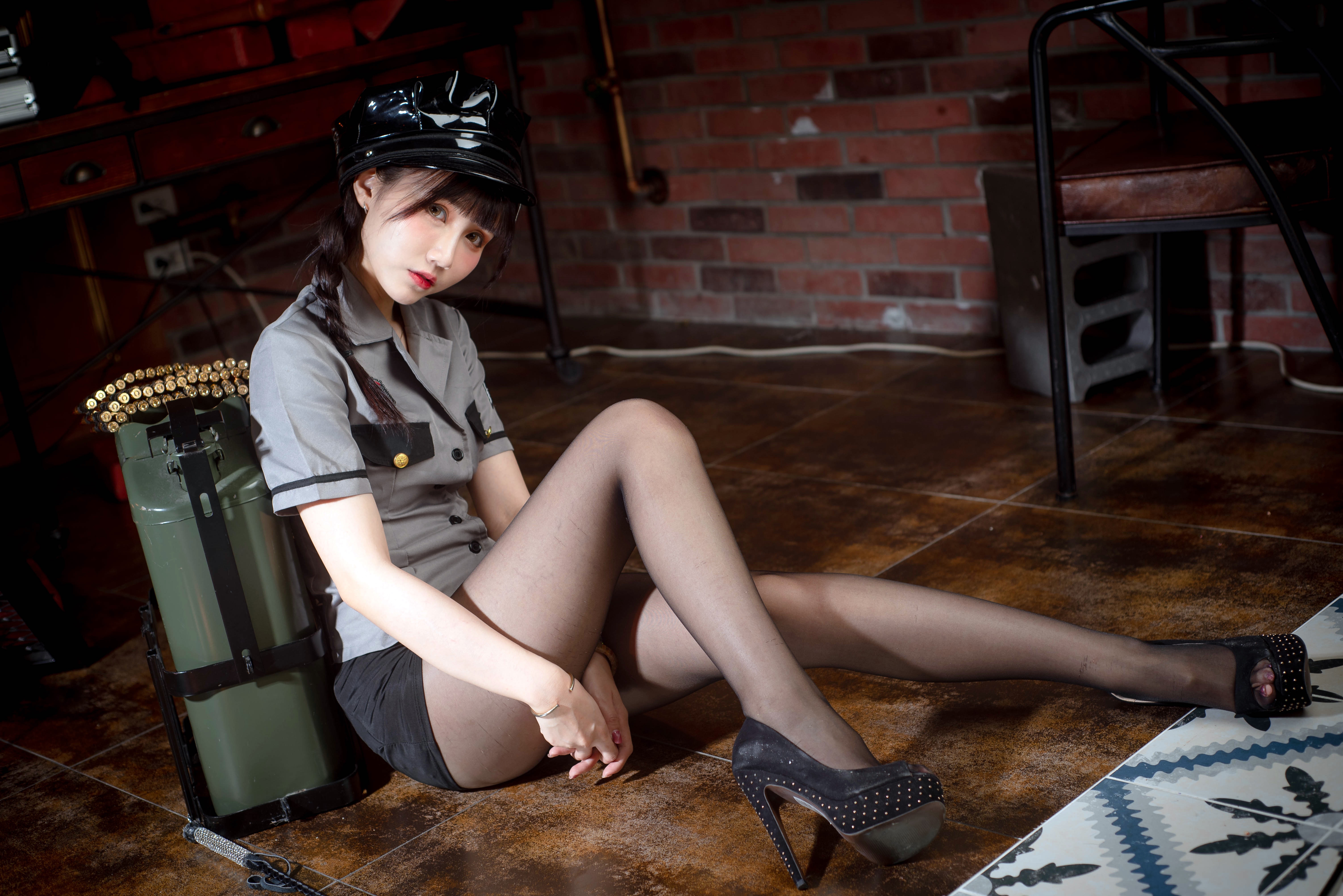 People 6016x4016 Asian model women long hair dark hair sitting police costume hat bricks wall ammunition whips high heels chair braids ponytail carpet fuel canister power cord leaning looking at viewer pantyhose